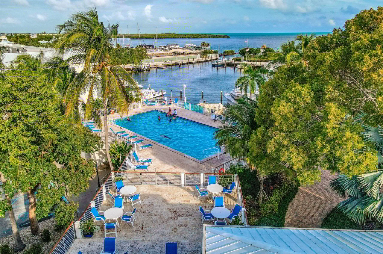 A condo communitys waterfront swimming pool.