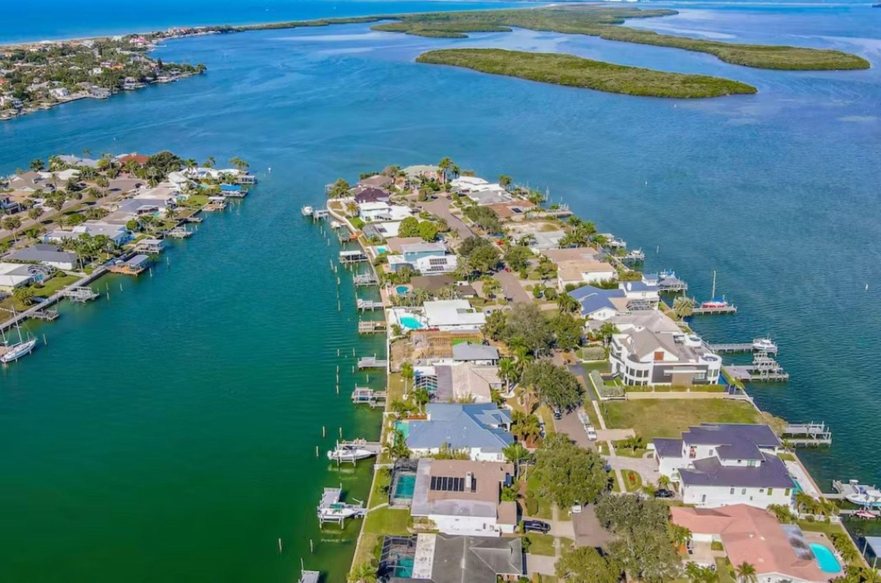 A birds eye view of many waterfront Clearwater vacation homes.