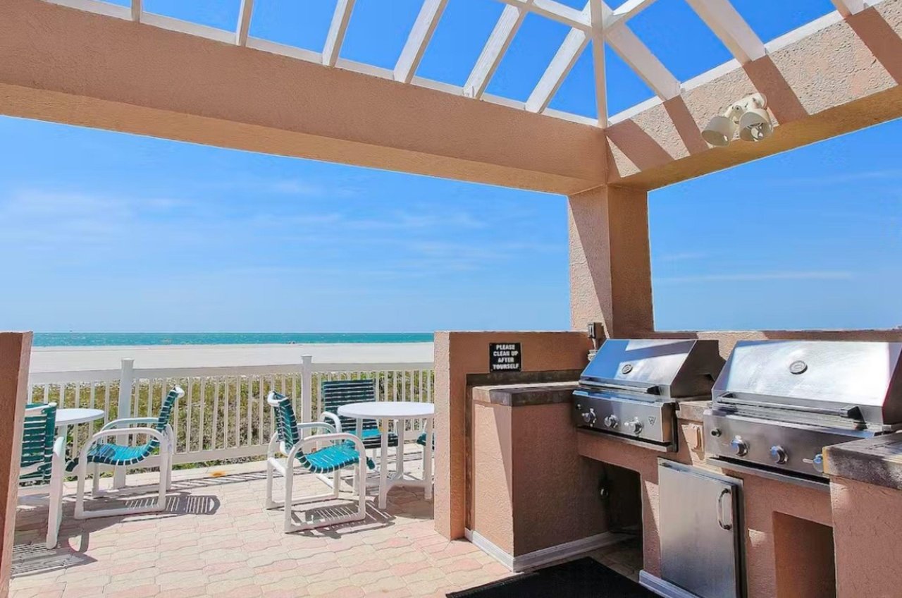 This Crescent Beach Clubs patio sits beside a beautiful Clearwater beach.