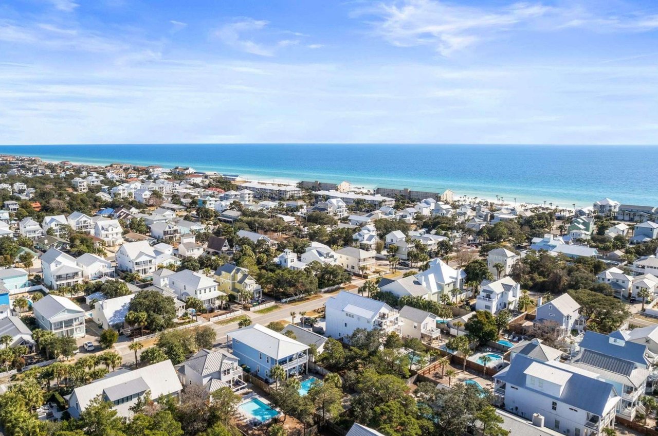 Aerial view of houses in Destin Florida with the Gulf of Mexico in the background