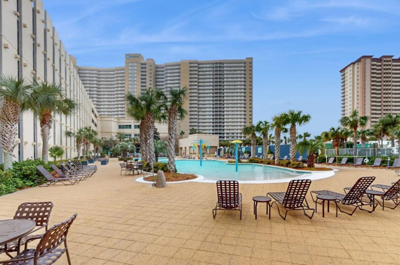 The pool deck and swimming pool in front of Emerald Beach