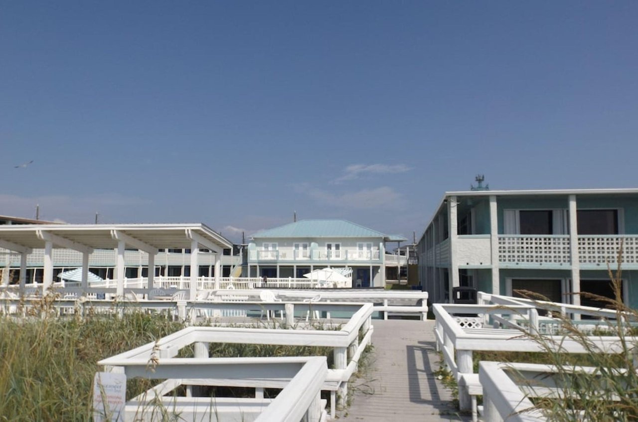 View from the beach of Buccaneer Inns exterior
