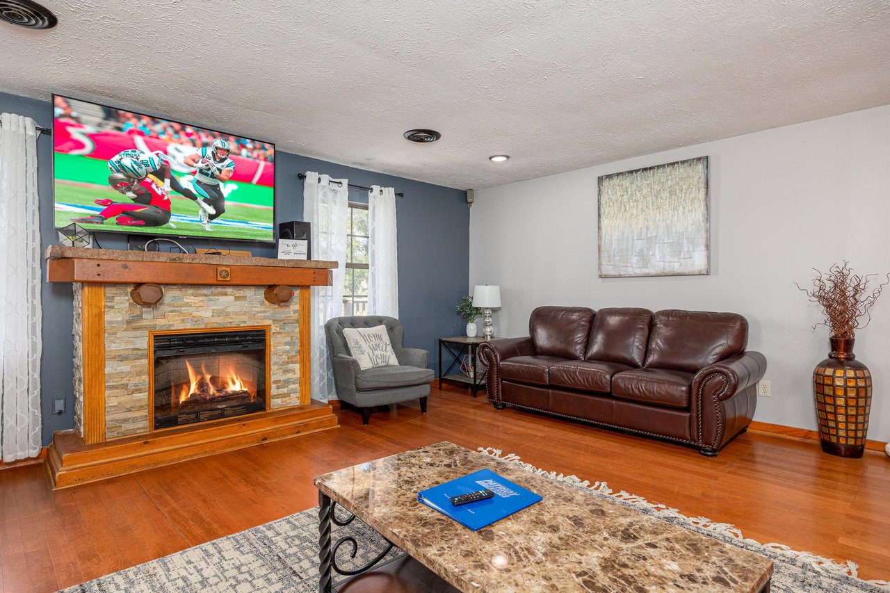 Fireplace and Flat Screen TV at Hoop Dreams Lodge