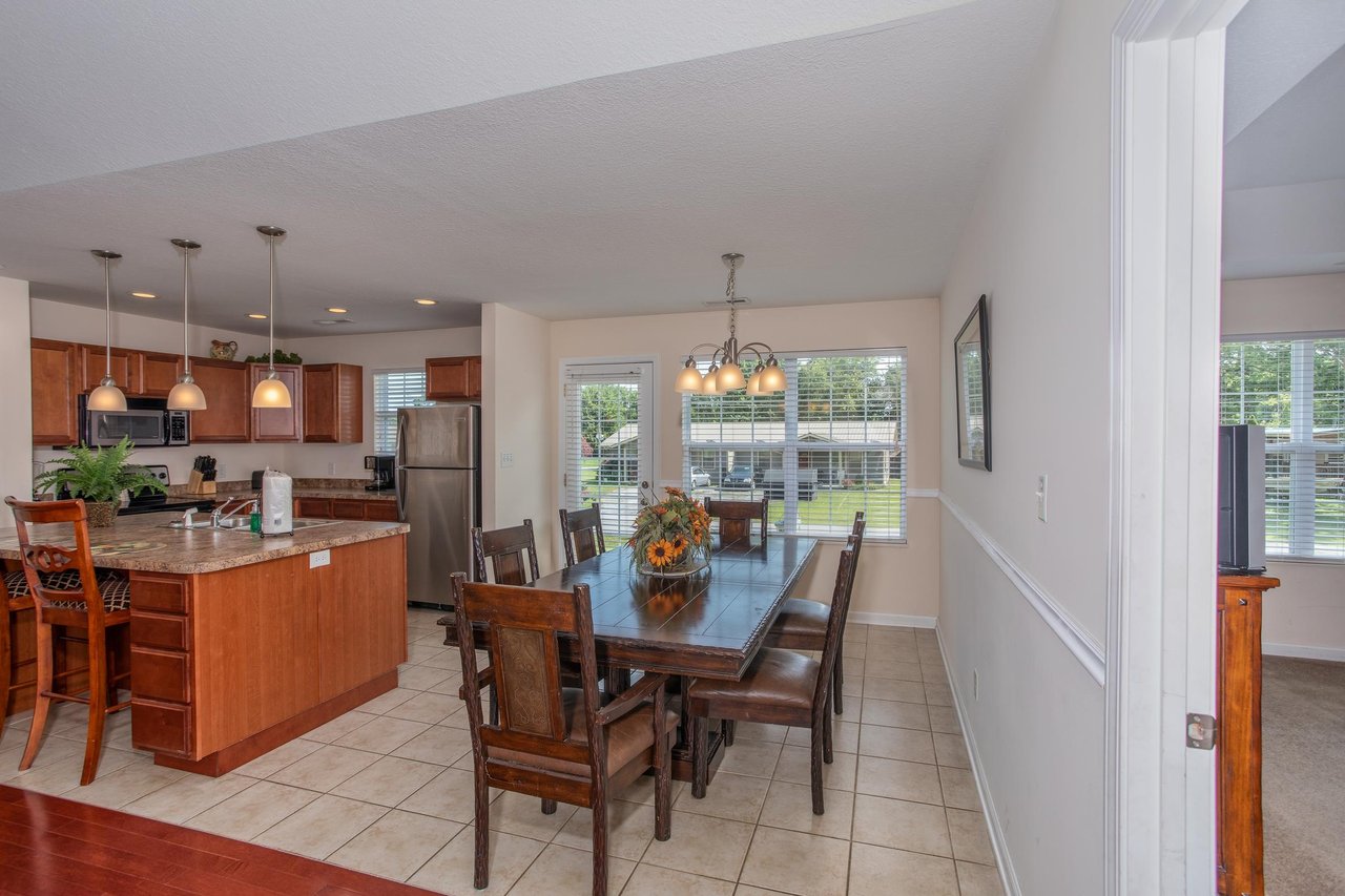 Dining room table with seating for six at A Pigeon Forge Retreat, a 2 bedroom cabin rental located in Pigeon Forge