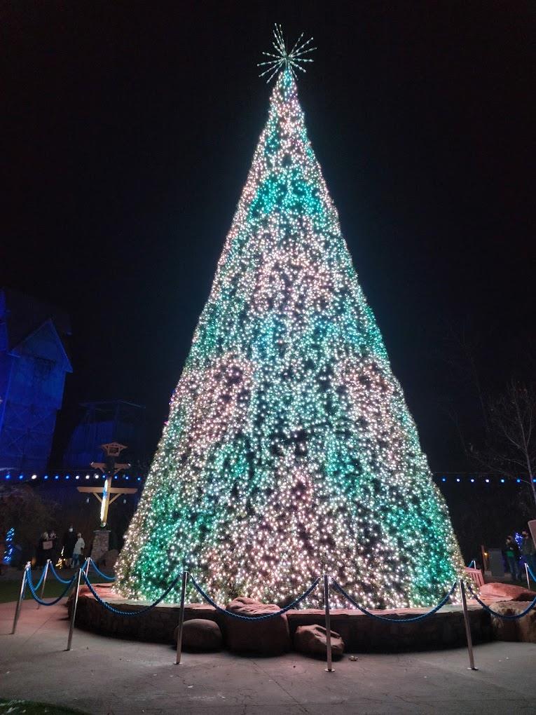 Brightly lit multicolored Christmas tree