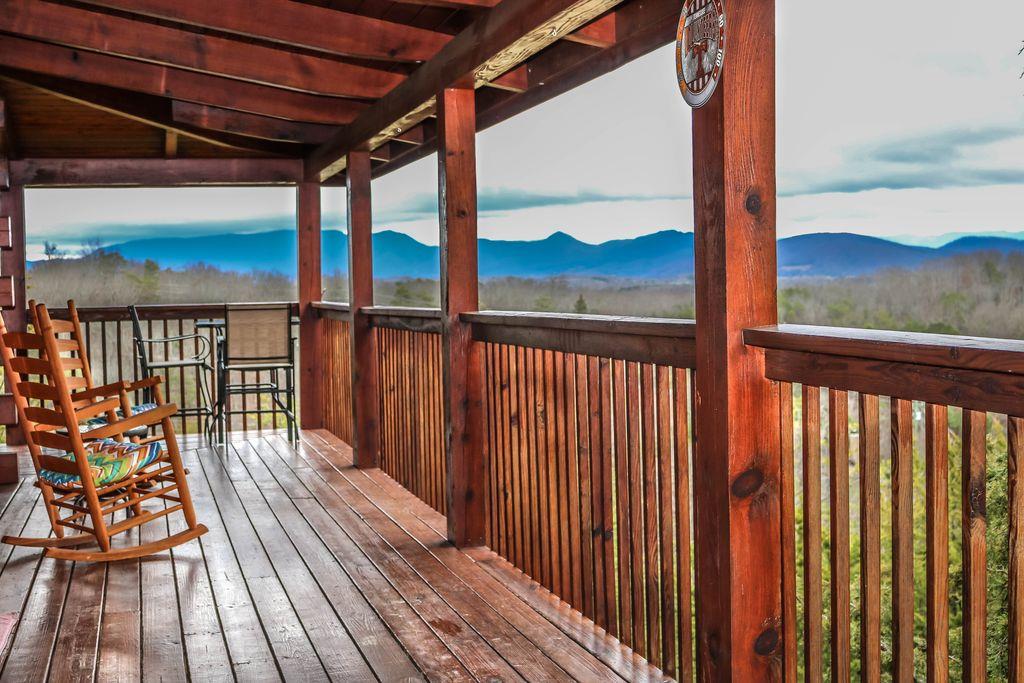 Mountain views from the covered deck at Eagles Nest, a 2bedroom cabin rental located in Sevierville