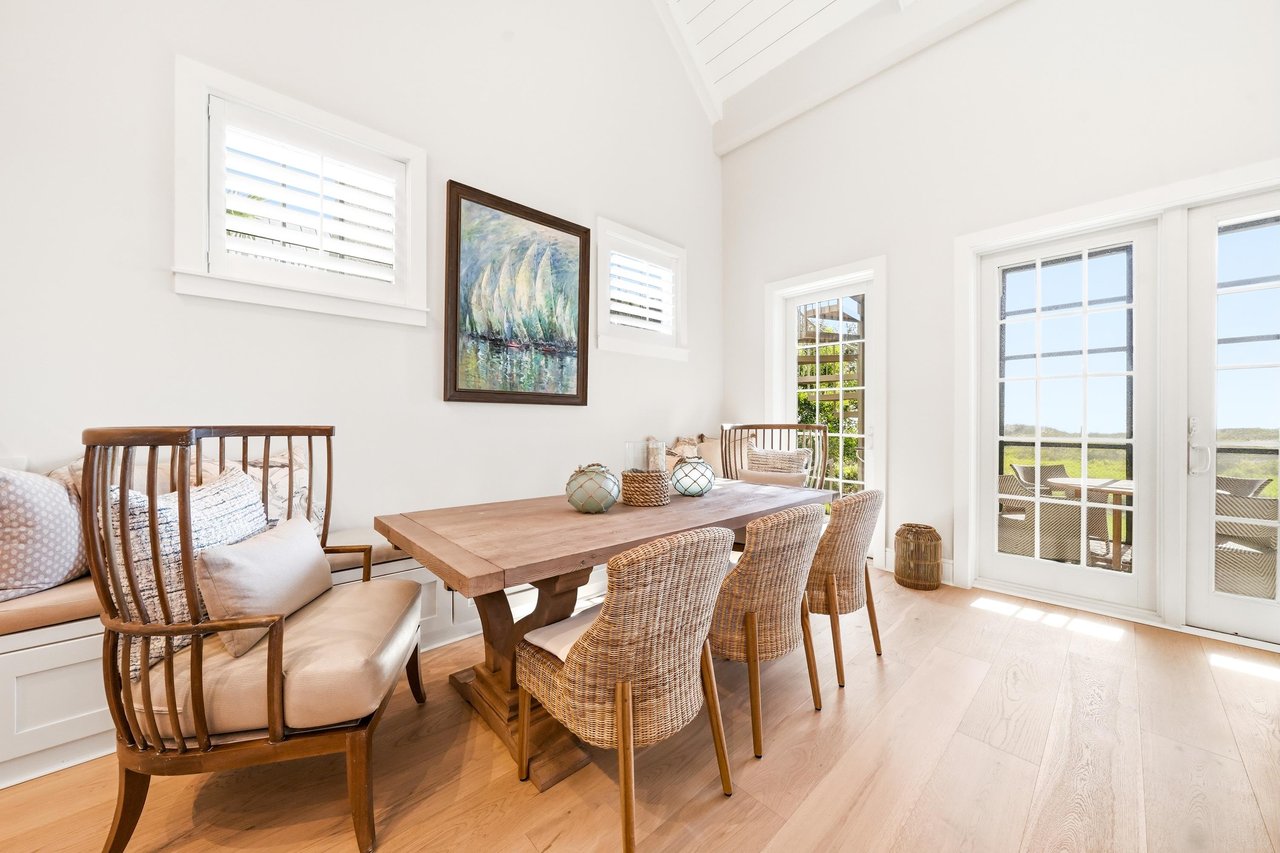 Carry breakfast through the glass doors for a table overlooking the dunes.