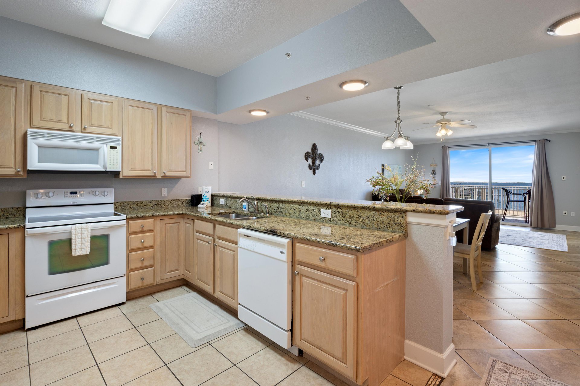 Modern Kitchen comes fully equipped and guests love the granite breakfast bar for snacking and seating extra guests.