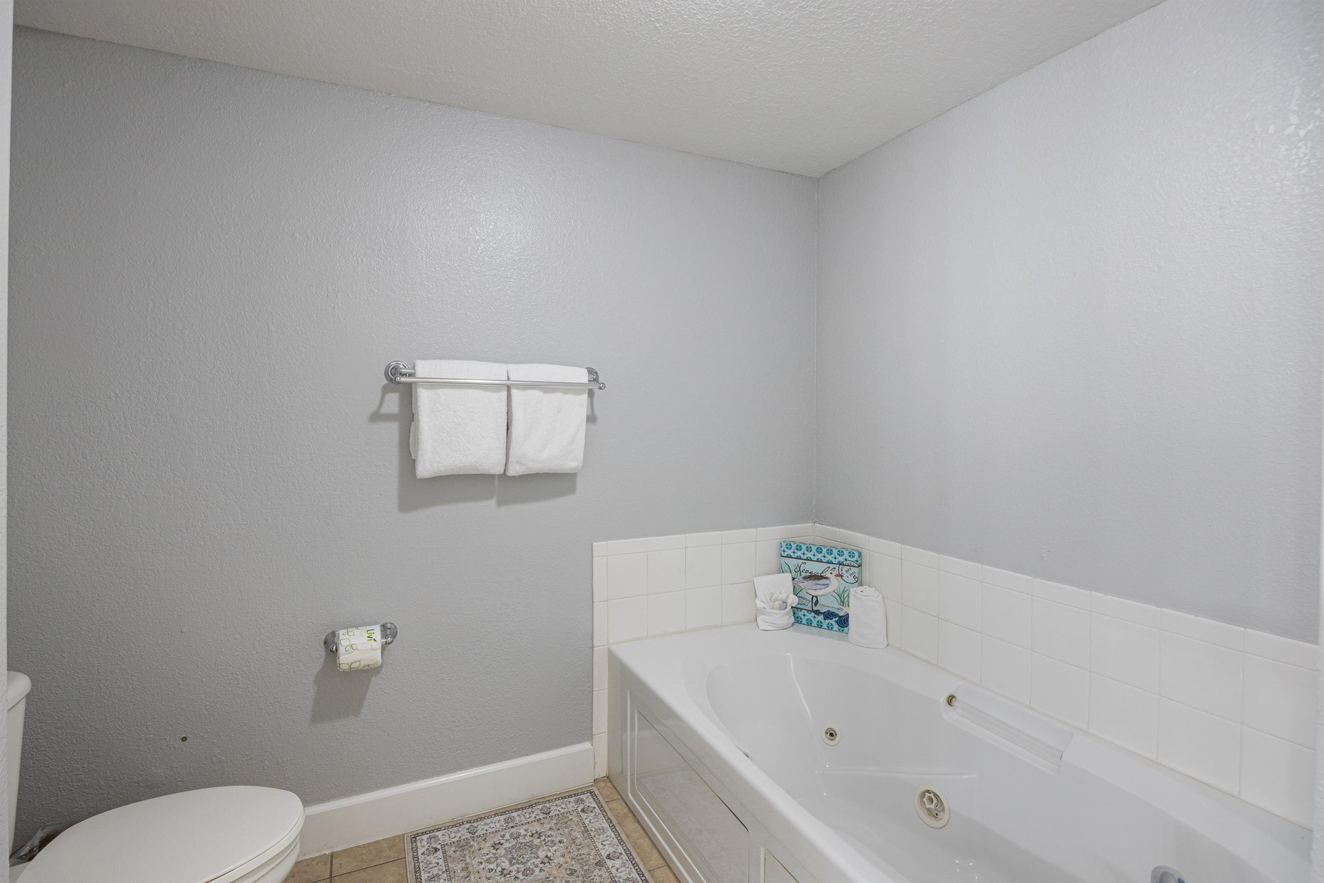 Primary bath offers a tub with jets for some relaxing soak therapy.