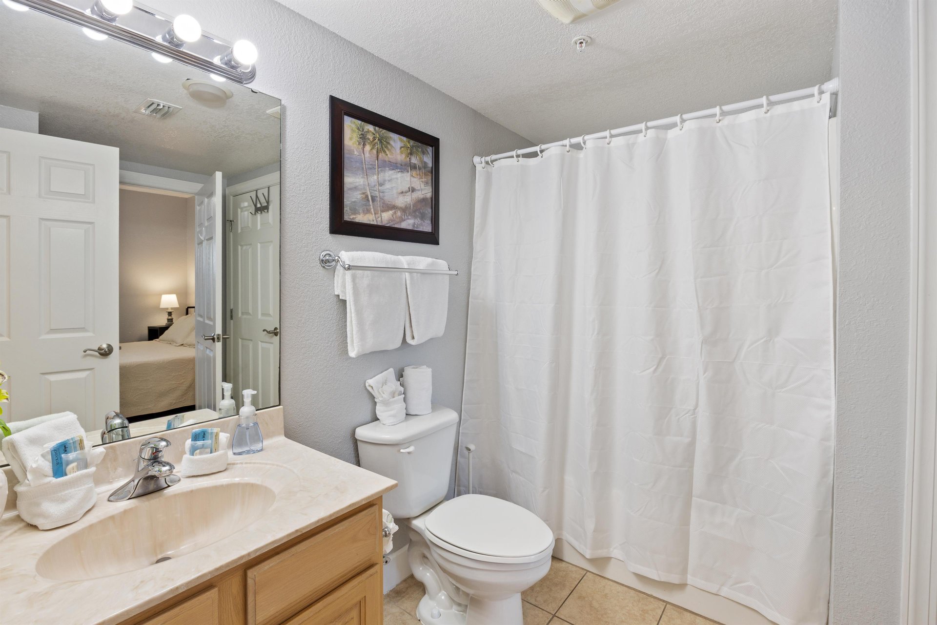 Guest Bath is ensuite and serves living area, as well.