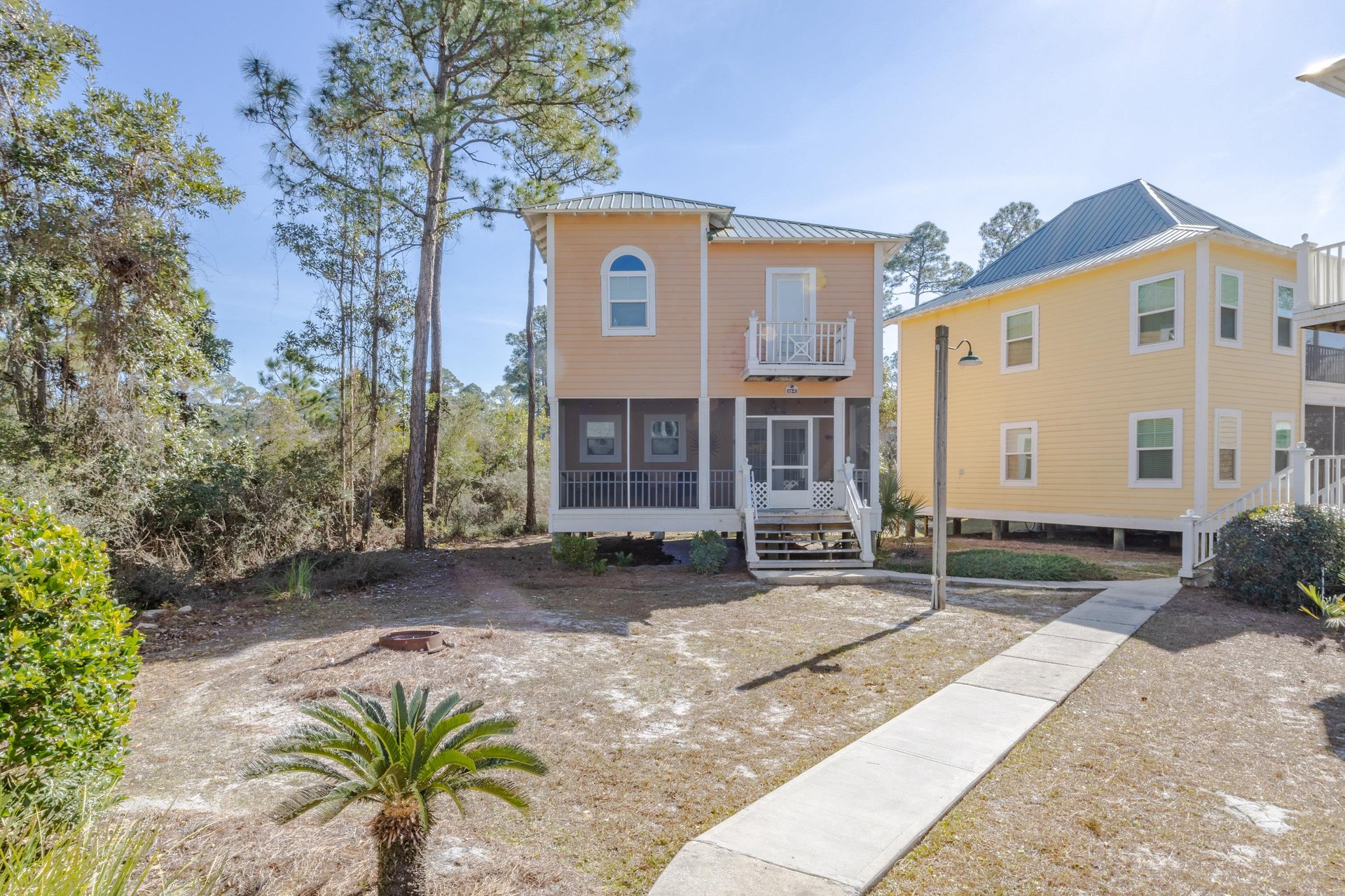 This coastal cottage backs up to a private greenspace for natural privacy.