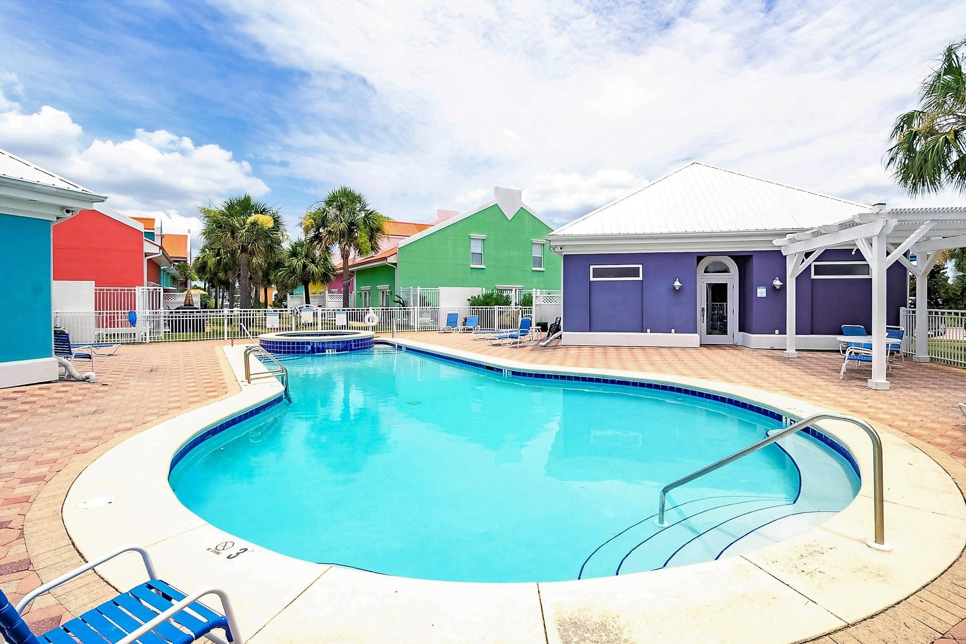Relax pool side within this gated community