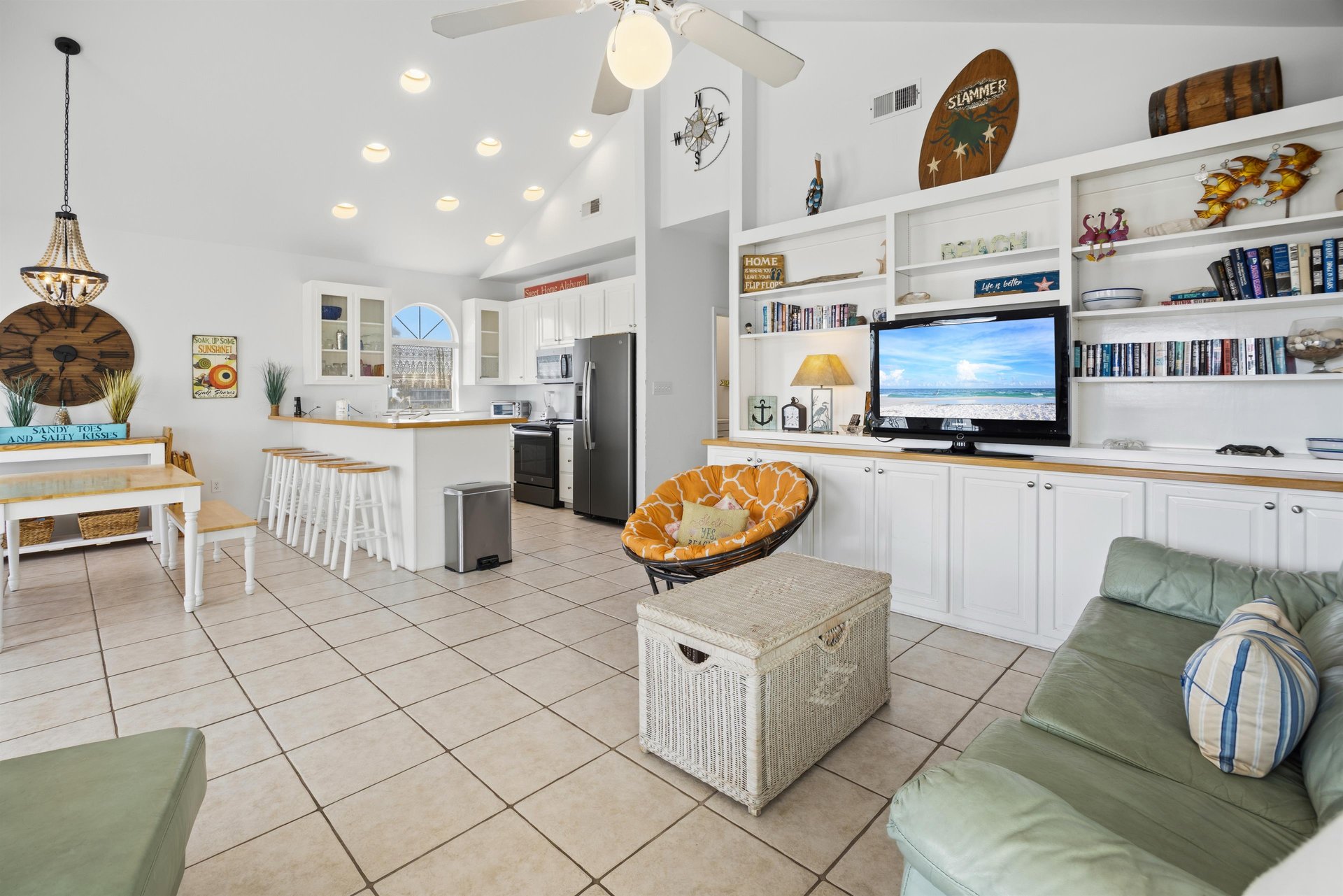Open layout connects kitchen, dining, and living areas—great for groups and families