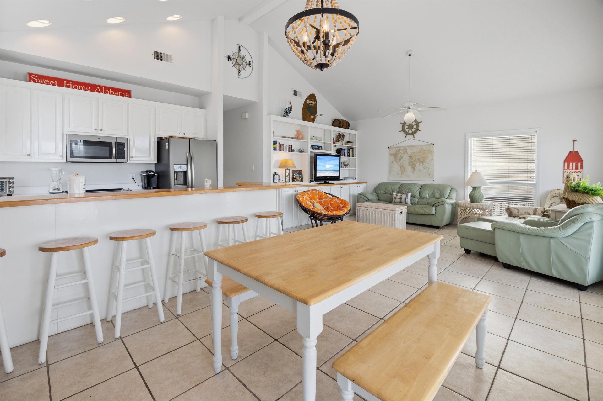 Open layout connects kitchen, dining, and living areas—great for groups and families