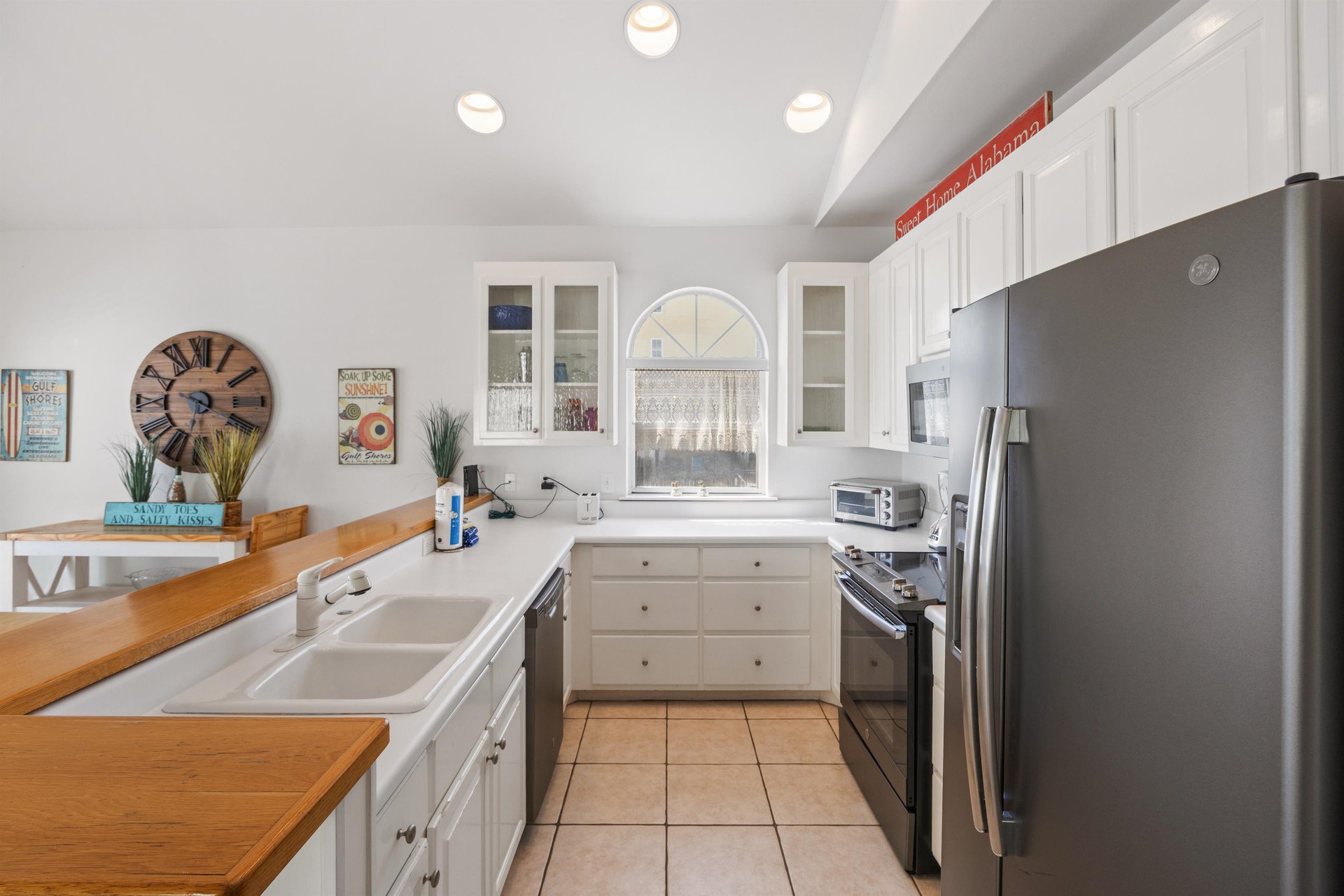 Wellstocked kitchen with modern appliances and plenty of counter space for cooking at home