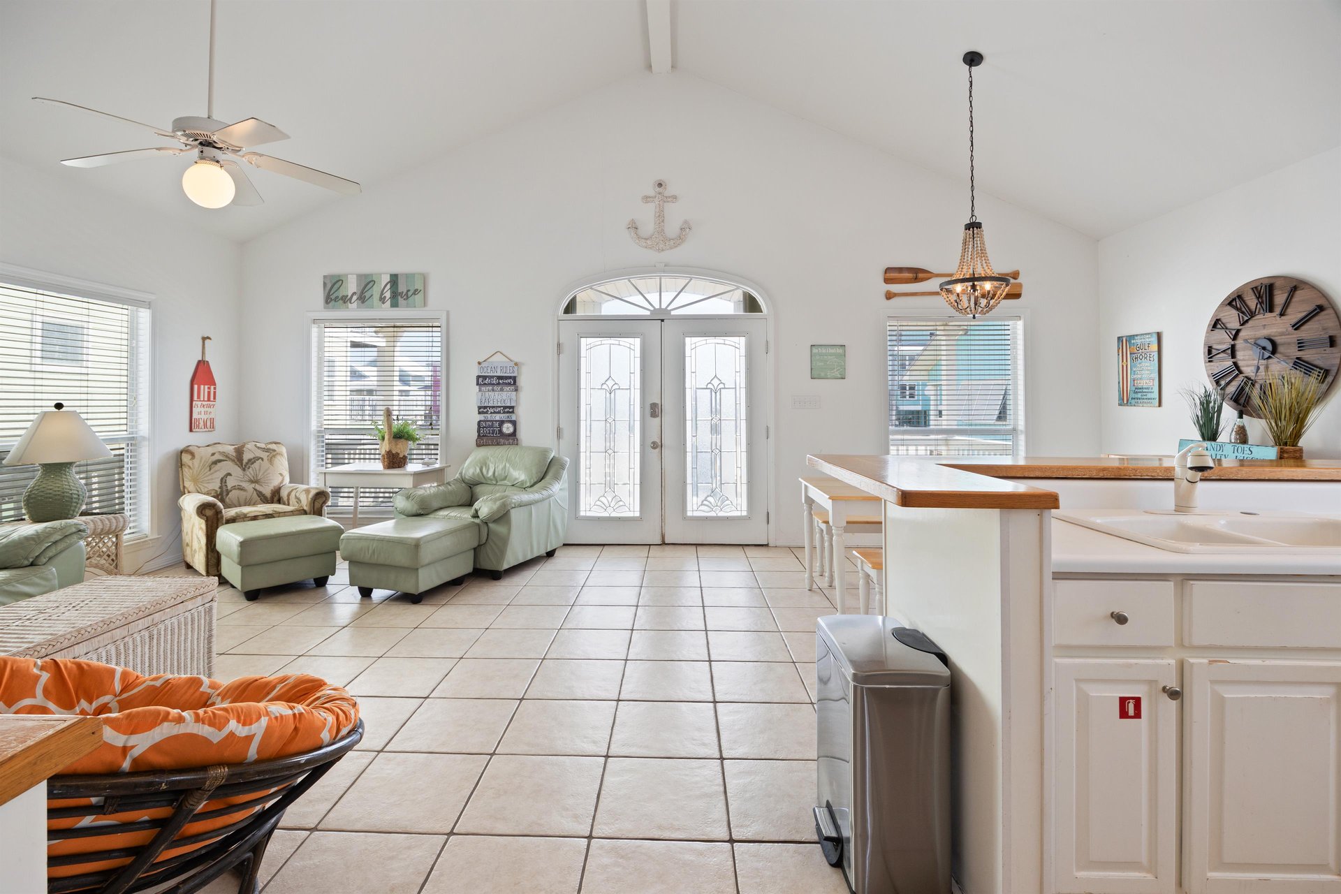 Relaxed coastal living space with easy flow into the kitchen and dining areas