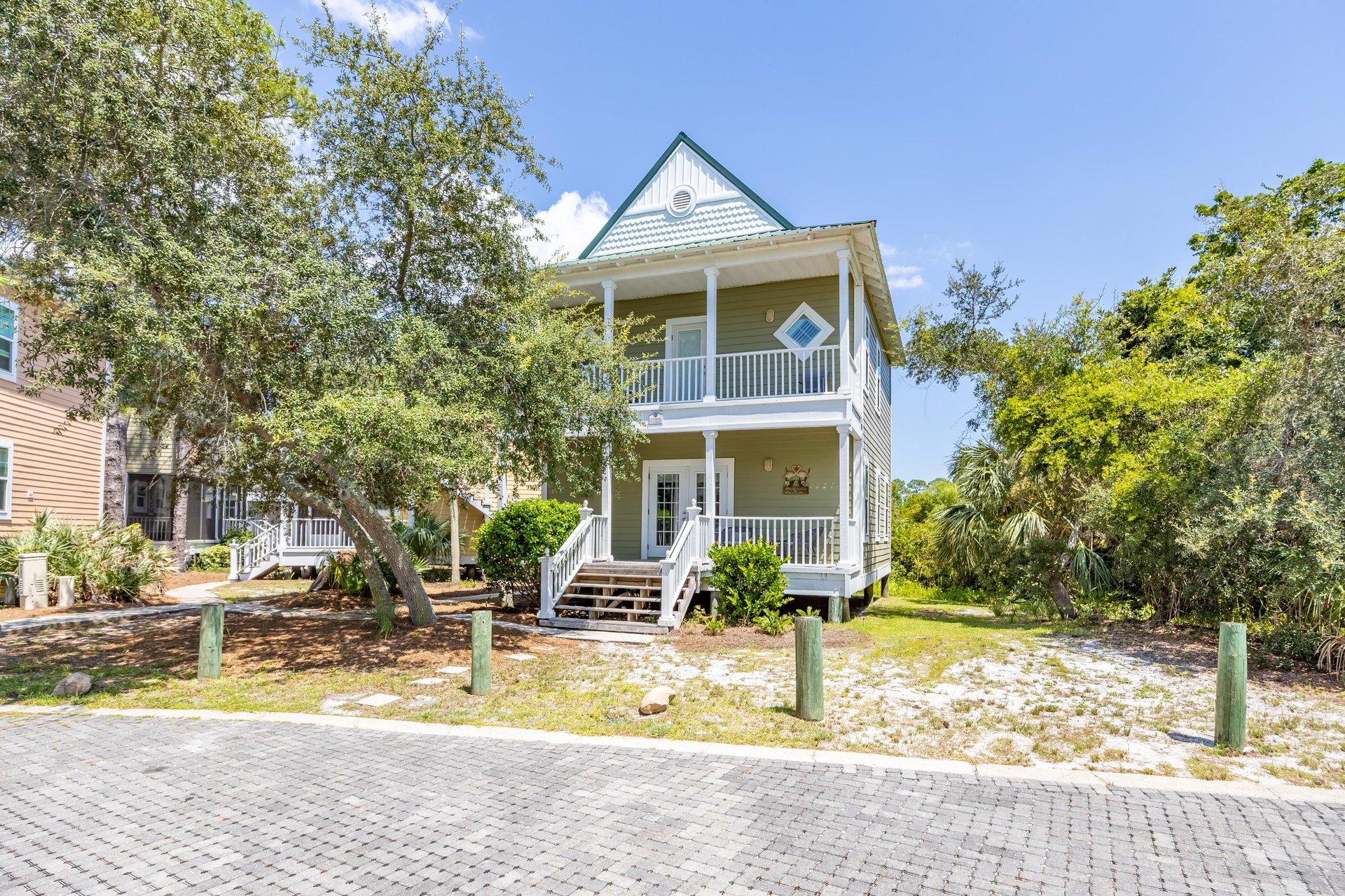 This is The Tiki Hideout—our villa tucked inside the gated Purple Parrot Resort, just minutes from the beaches of Perdido Key