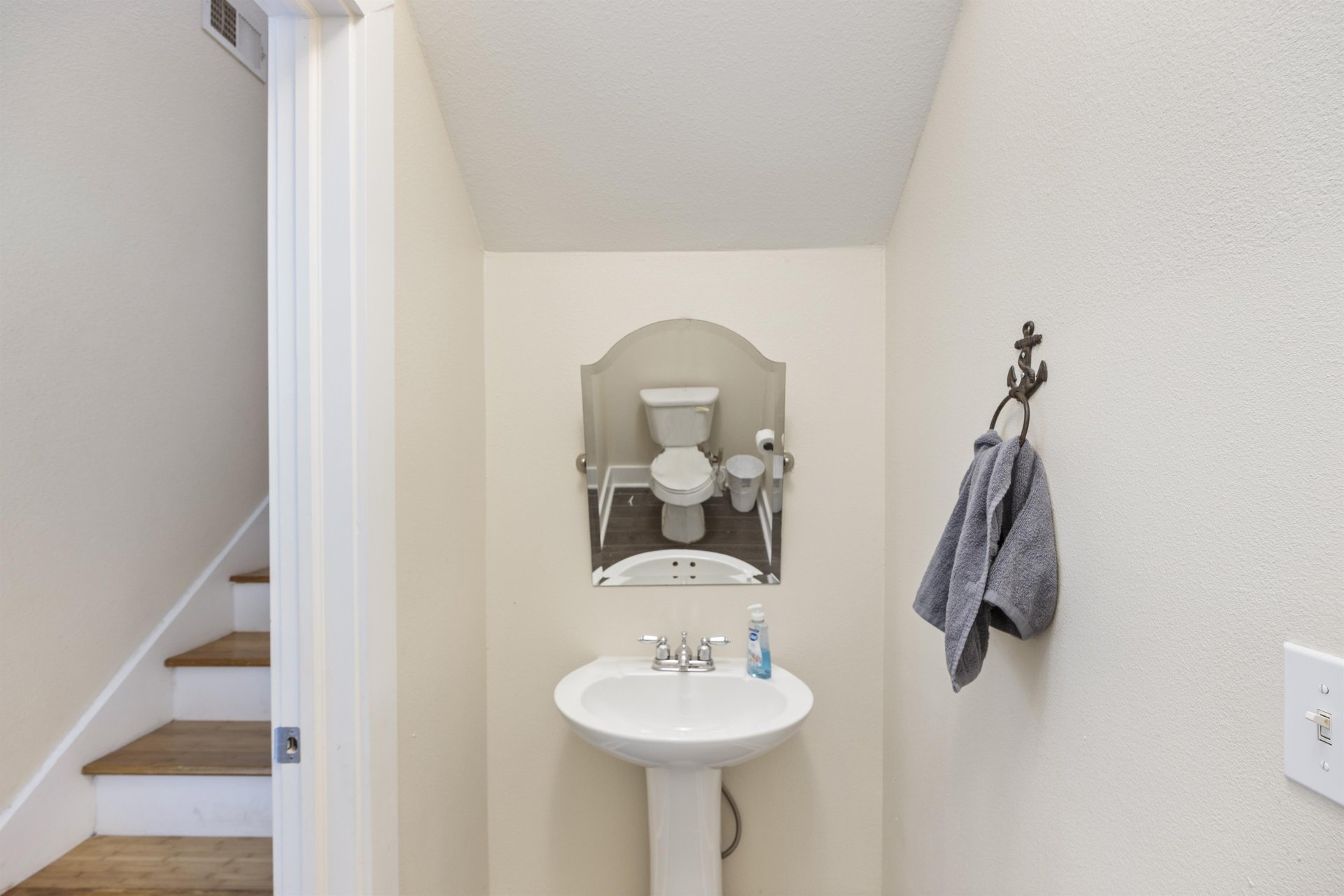 Convenient half bath on the main level—especially helpful when traveling with a group