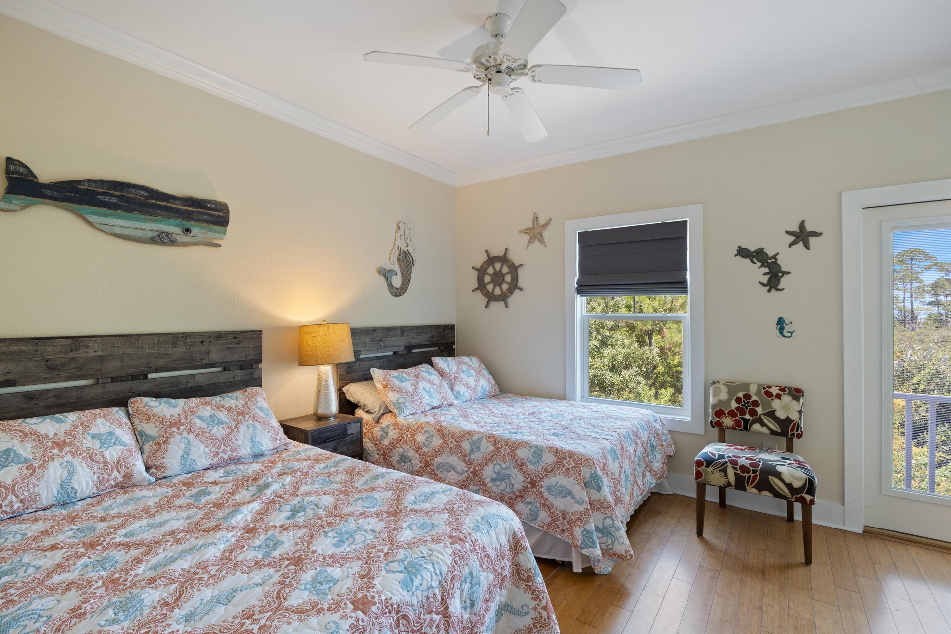 Guest bedroom with two full beds—ideal for kids, teens, or another couple traveling with you