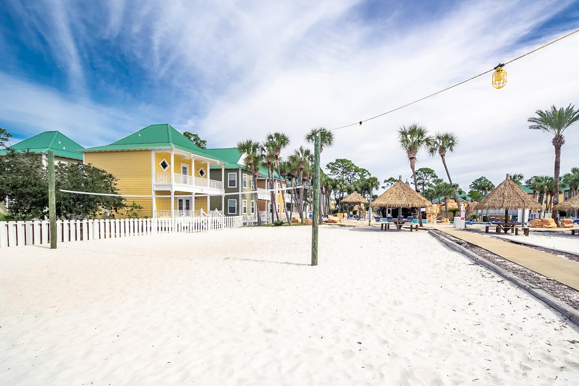 Sand volleyball court just off the pool deck—fun for families and groups looking to stay active