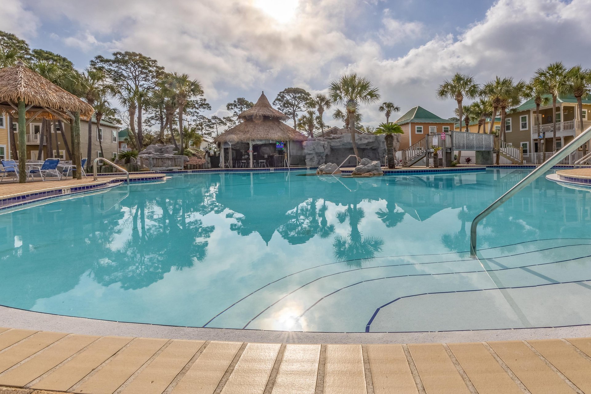 The lagoonstyle outdoor pool is the heart of the resort, complete with a waterfall cave and island hot tub