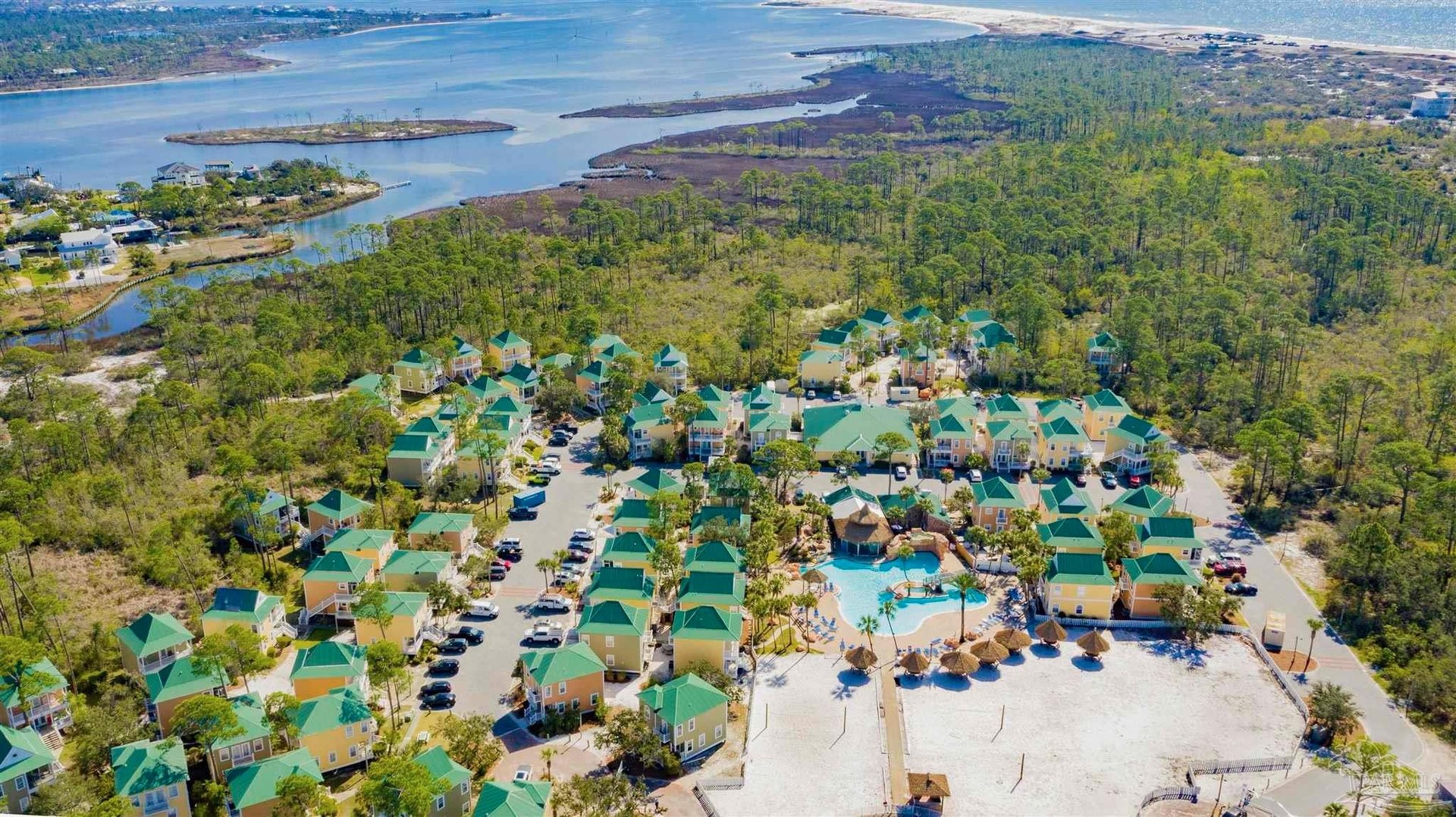 The gated resort backs up to a greenspace for excellent privacy.