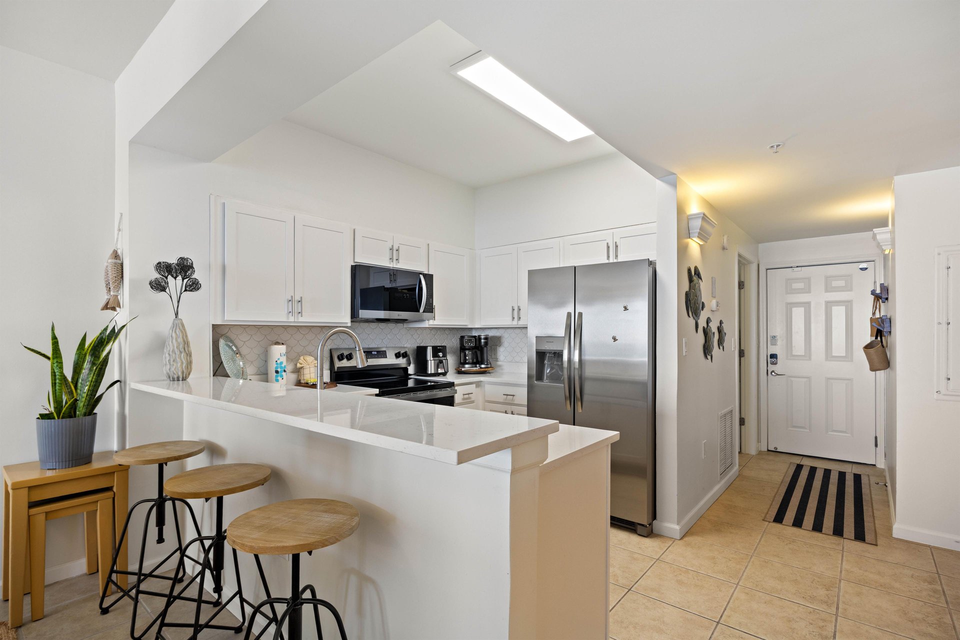 Modern kitchen with breakfast bar.
