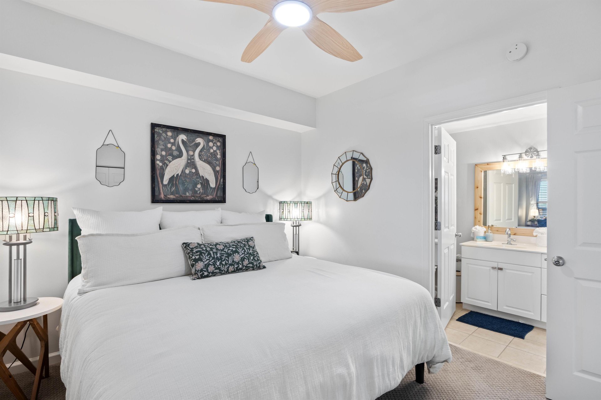 Primary bedroom is ensuite and walks out to private 6th floor balcony.
