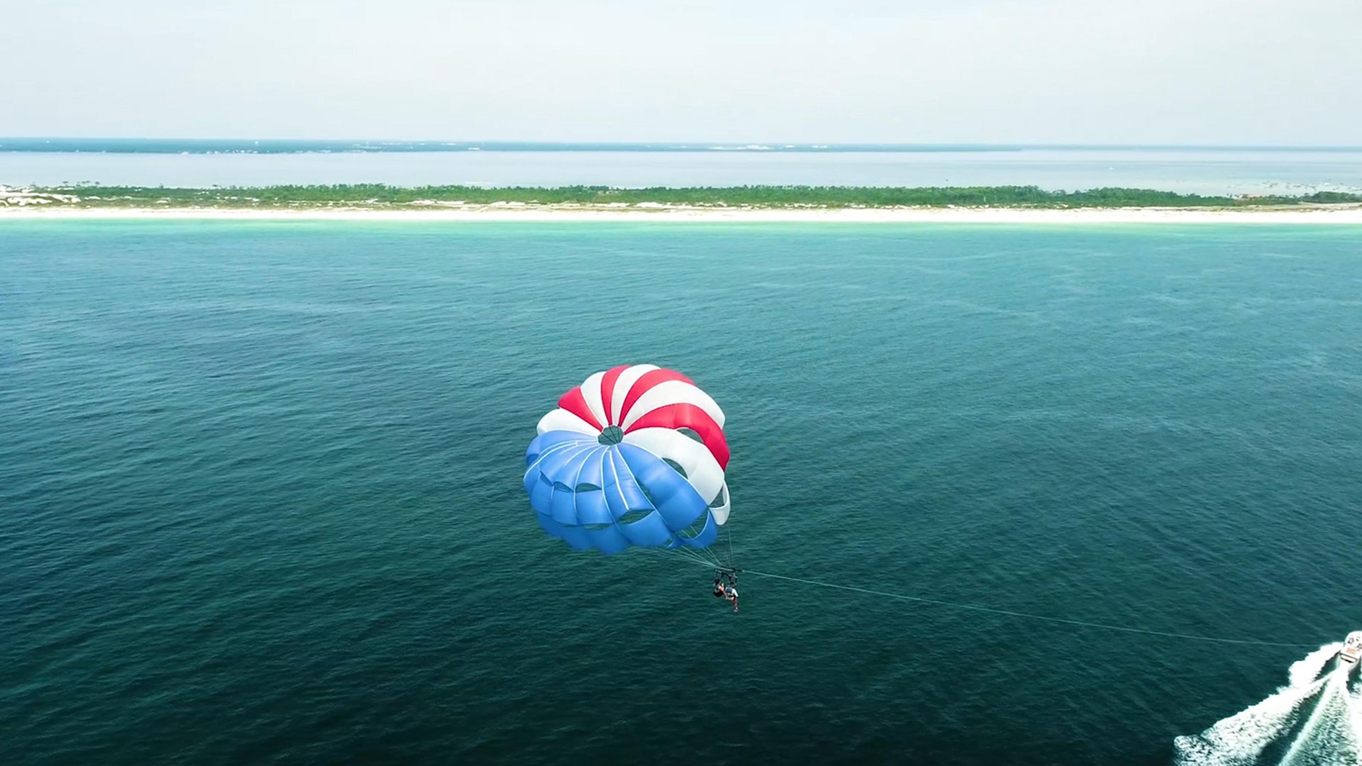 1 FREE adult ticket per day for parasailing seasonal