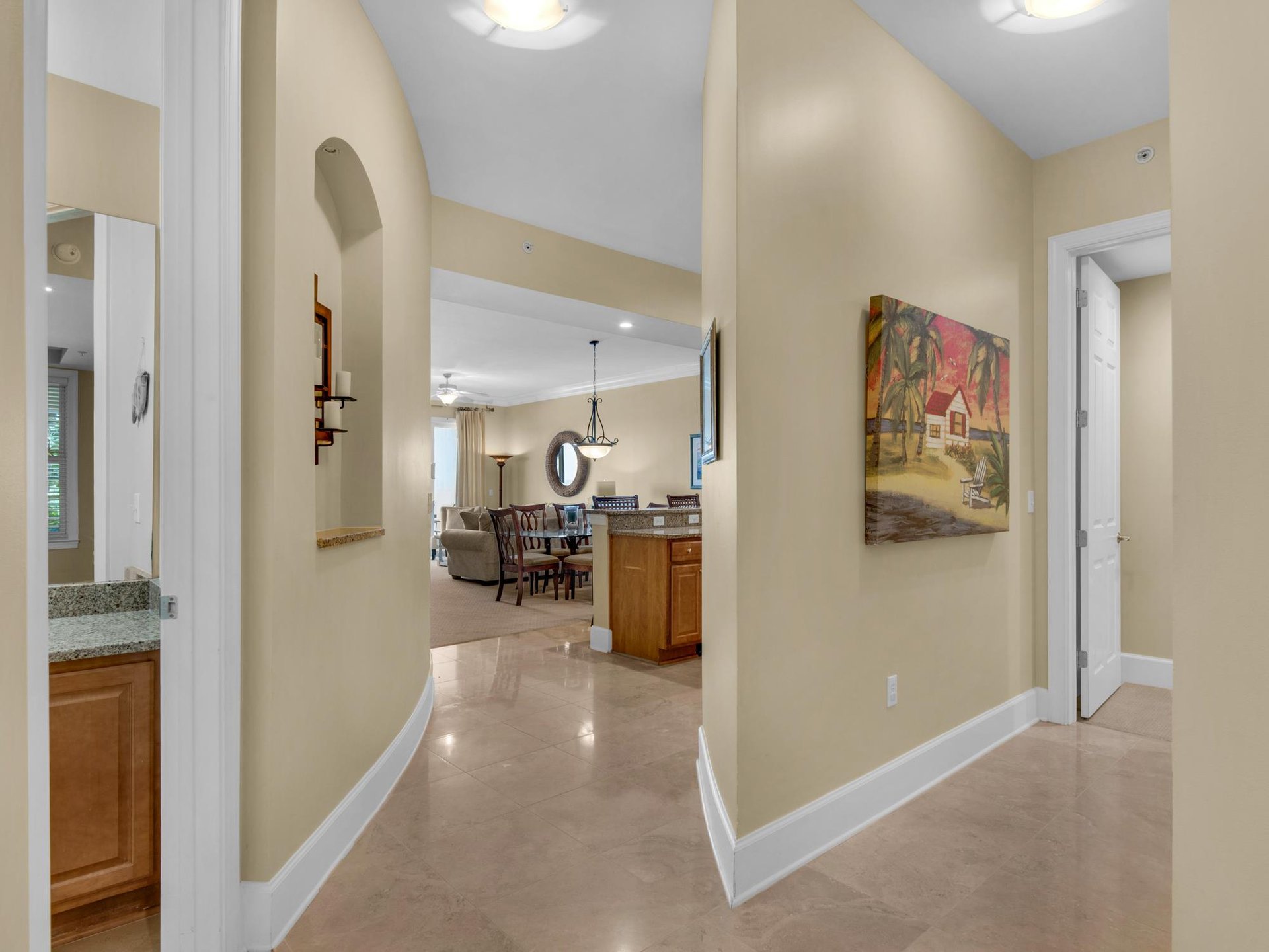 Half bath to the left, guest bedroom 2 to the right