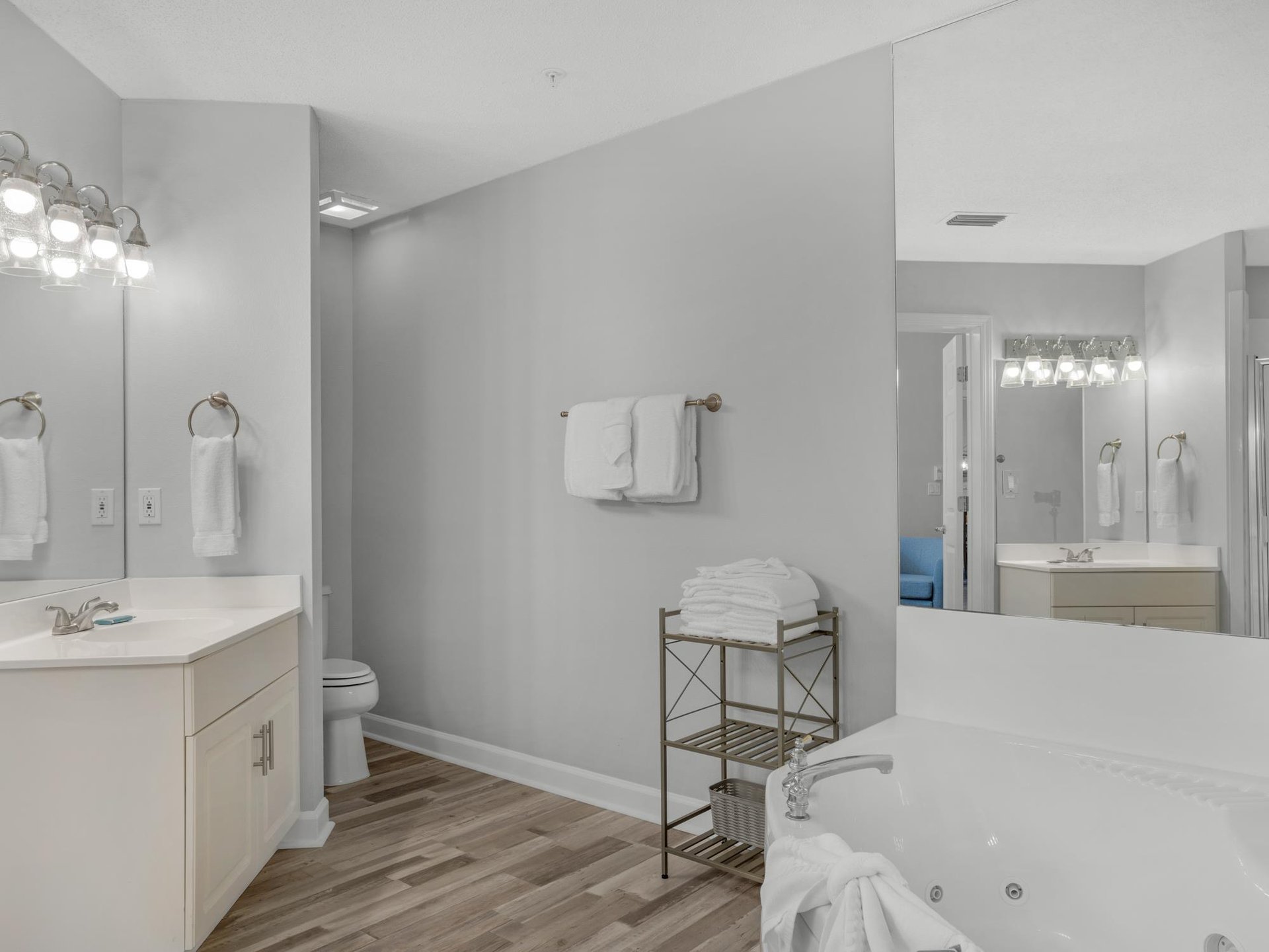 Primary bedroom with large private bathroom