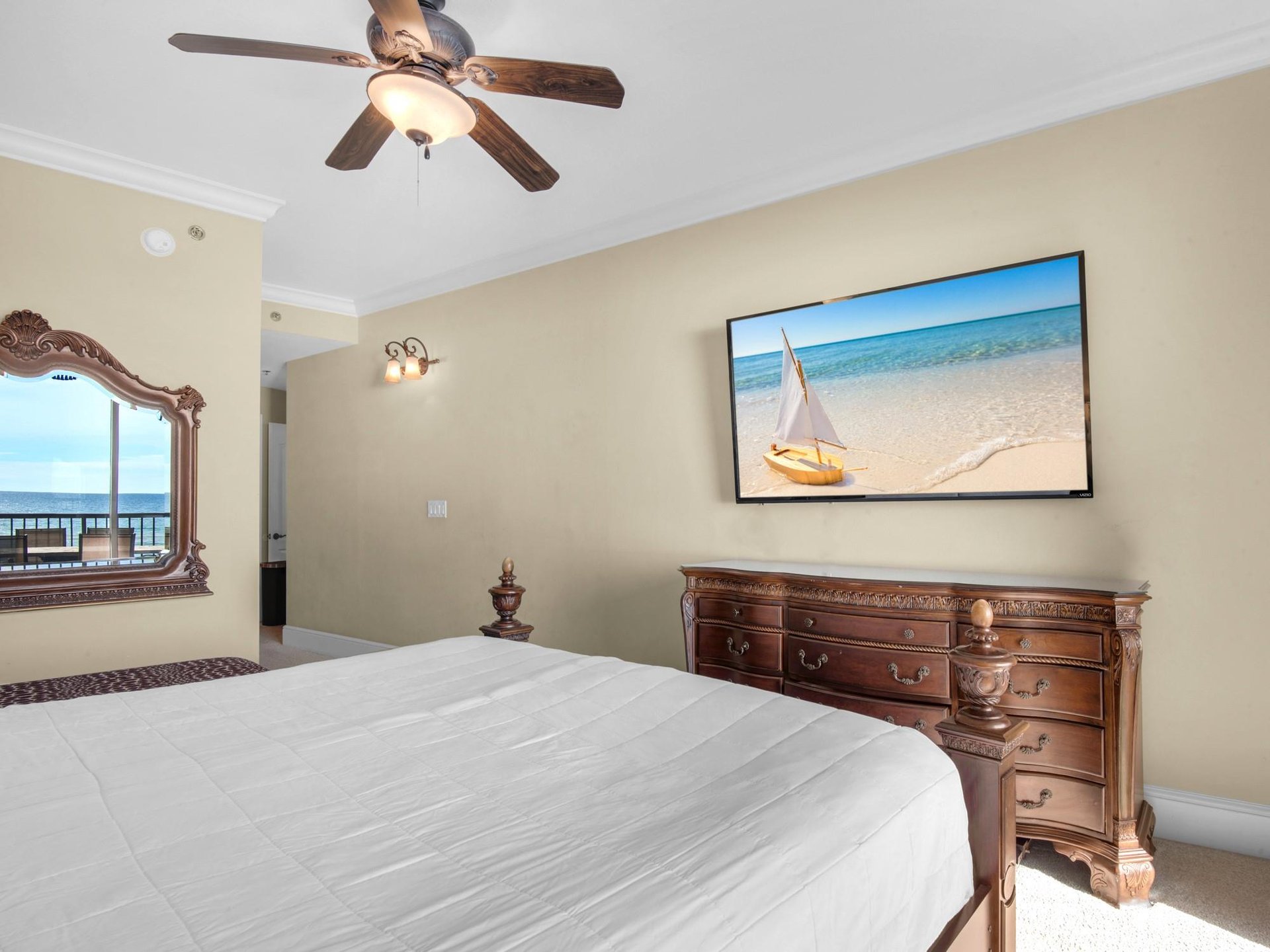 Primary Bedroom with Gulf View and large TV
