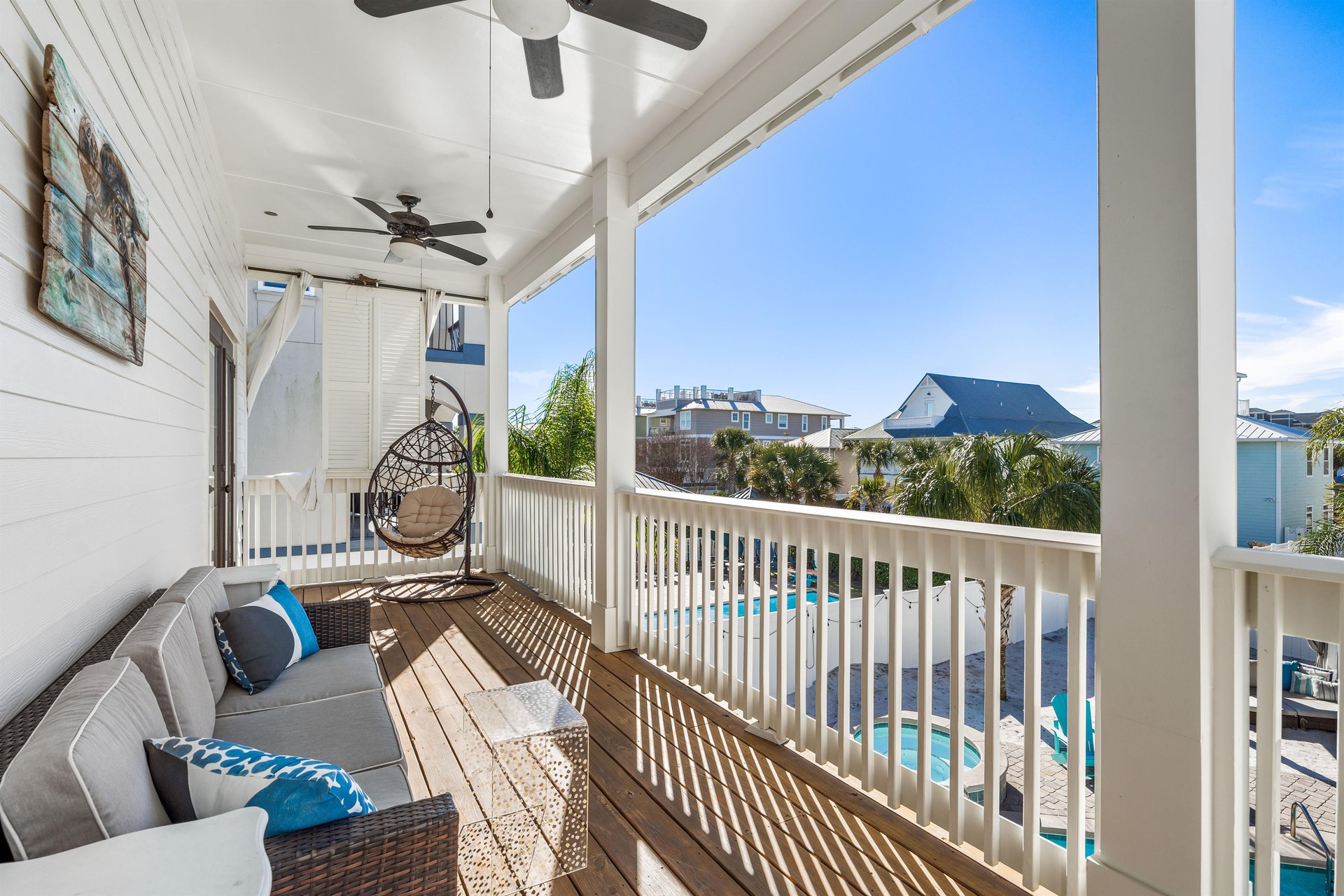 Seating on Balcony Overlooking the Pool on Back of House