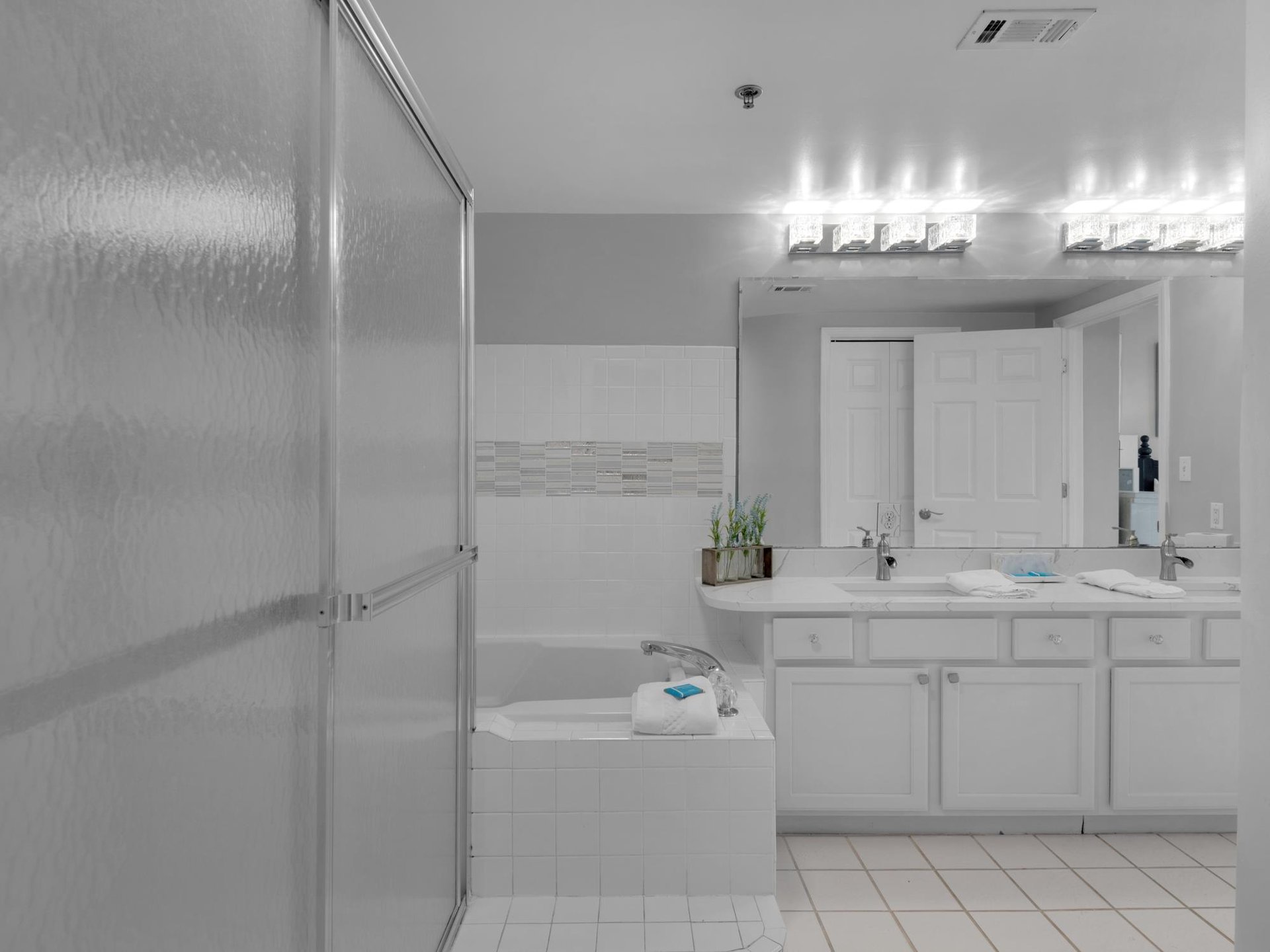 Primary Bathroom with WalkIn Shower and Tub