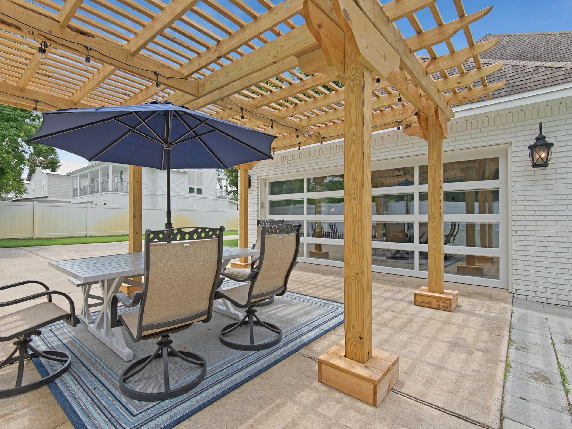 Pergola and Glass Garage Door