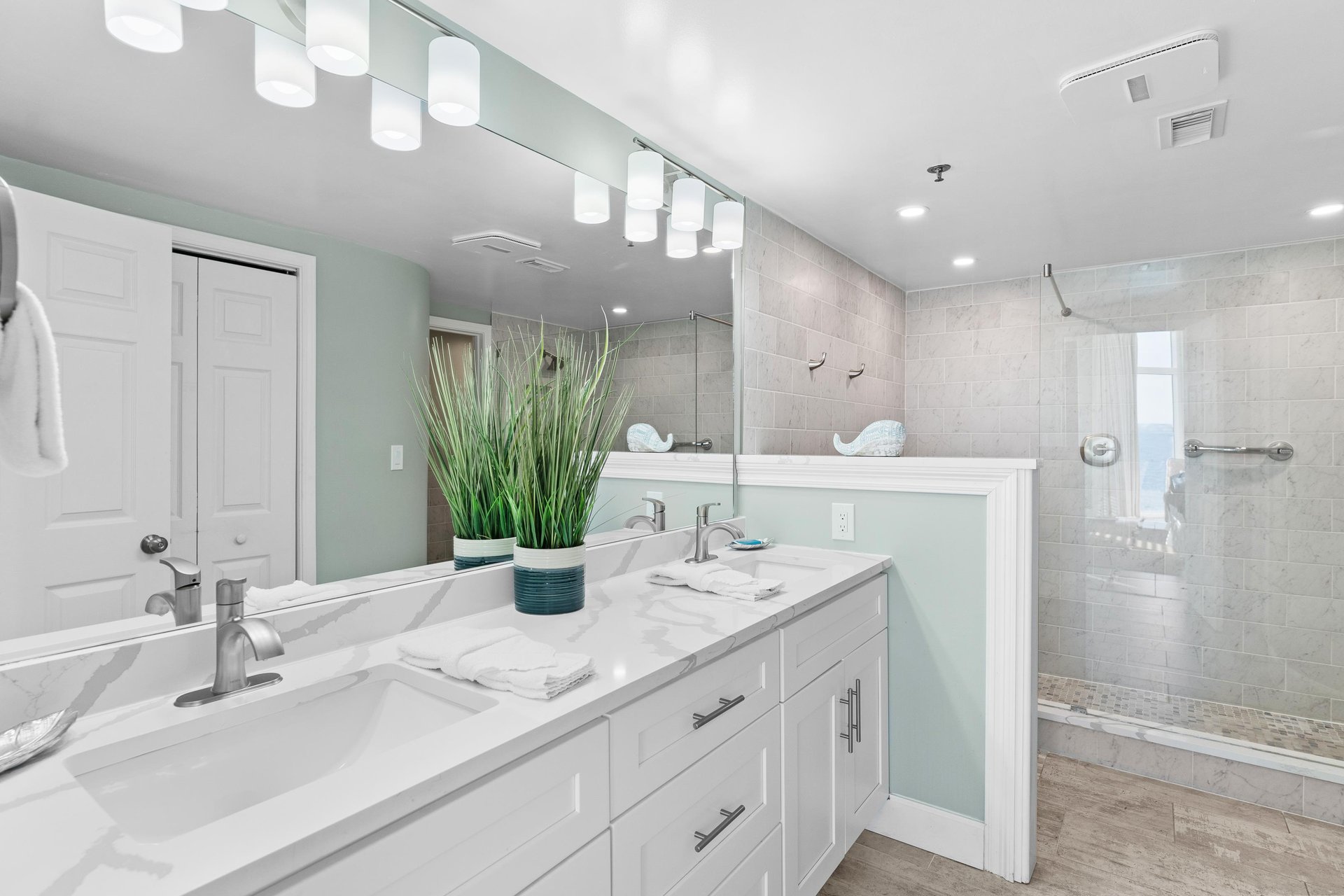 Primary Bathroom with Double Vanities and Walkin Shower