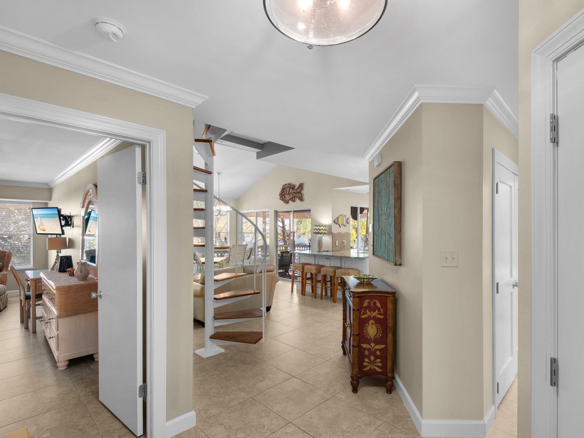 Cottage Entry with the Primary Bedroom to the left and Guest Bedroom to the Right