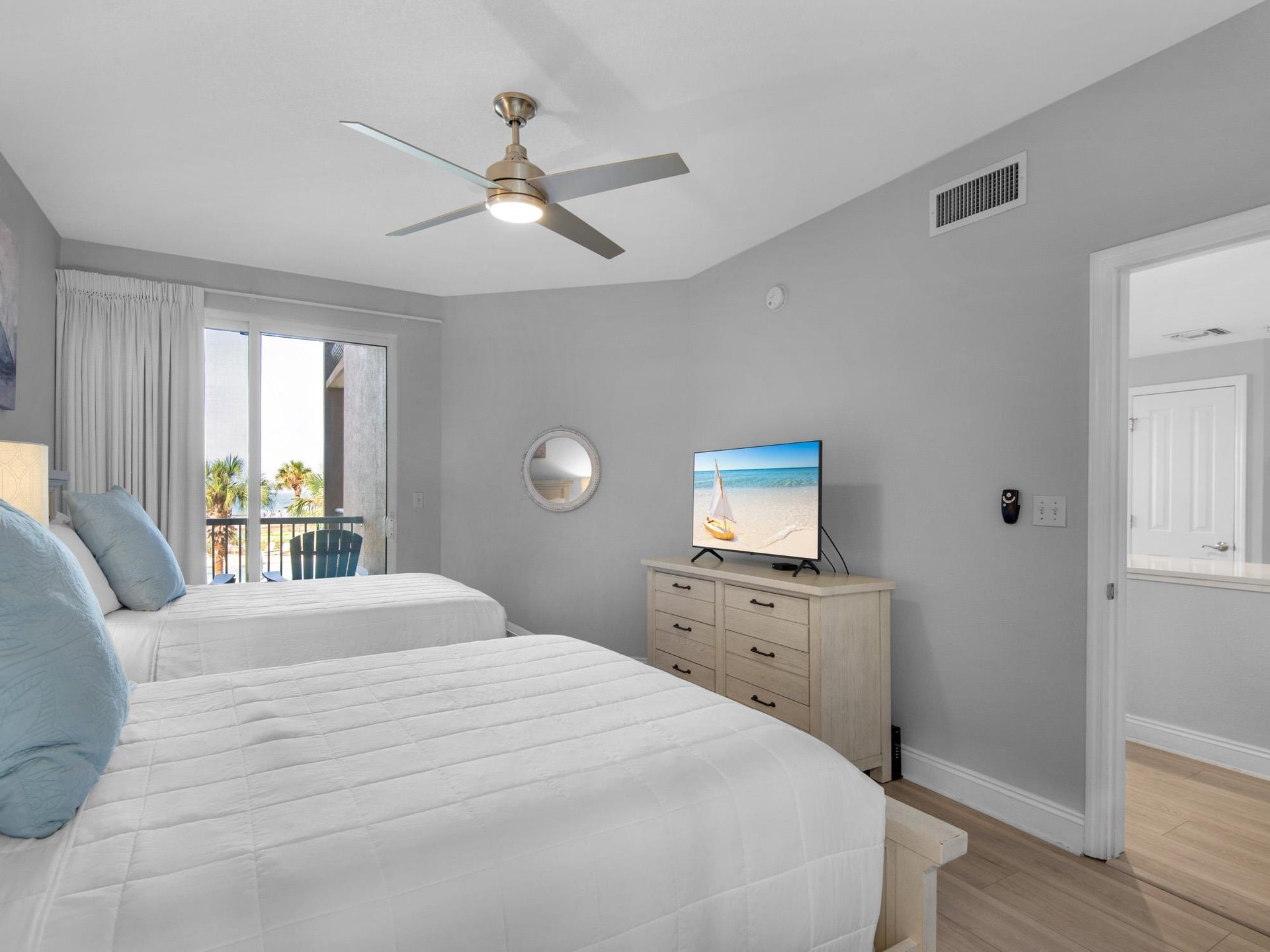 TV and Private Patio Access in Bedroom 2