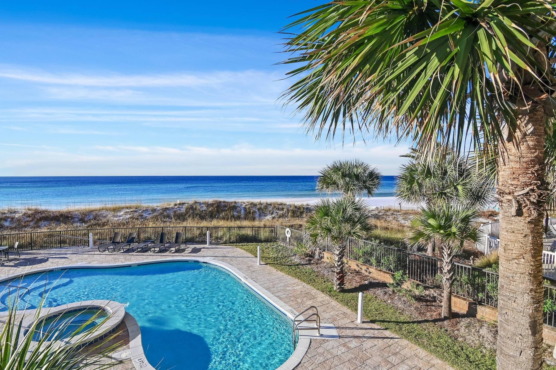Overlook the Pool and Gulf from Your Private Balcony