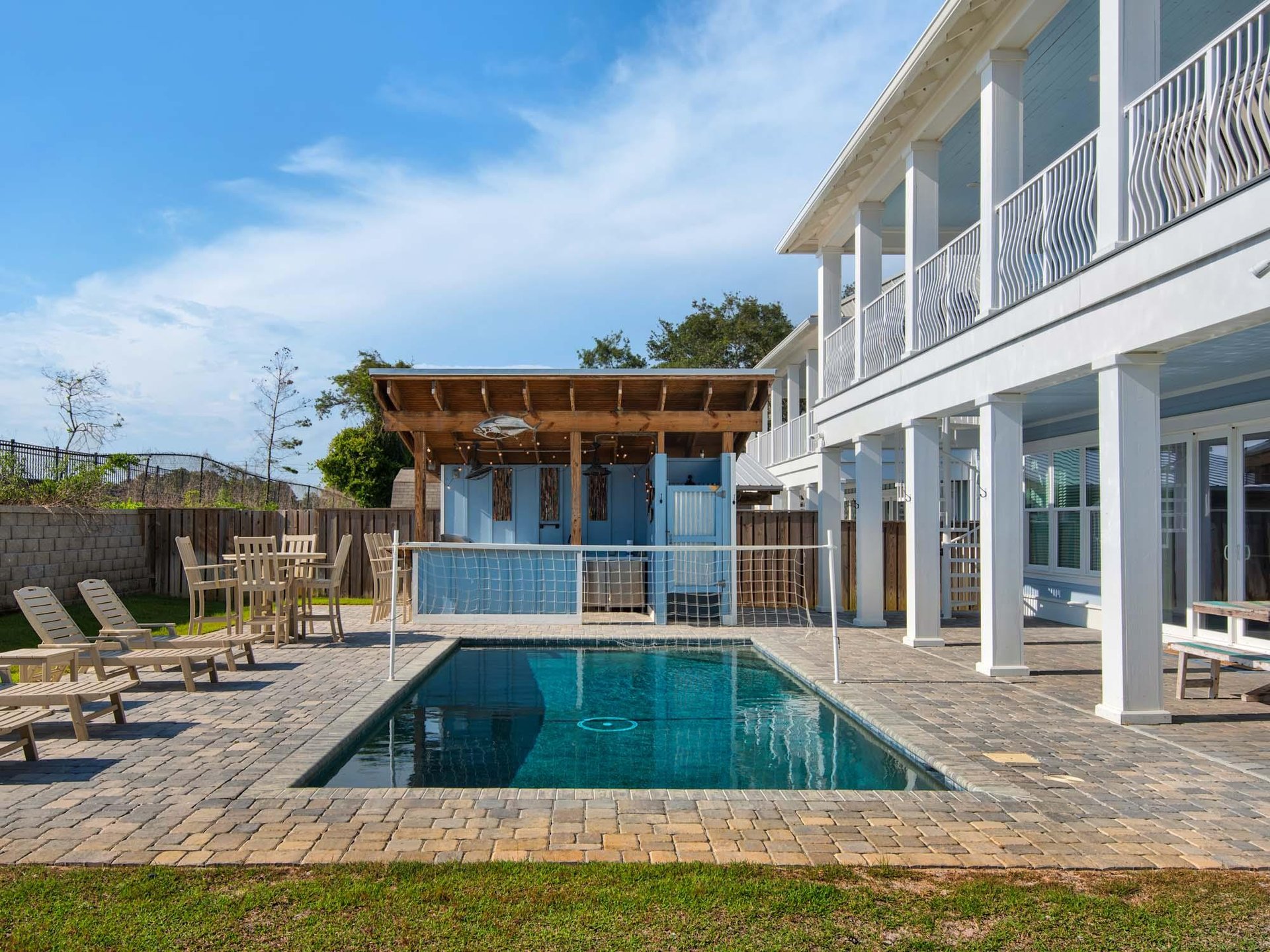 Pool  tiki area perfect for social gatherings