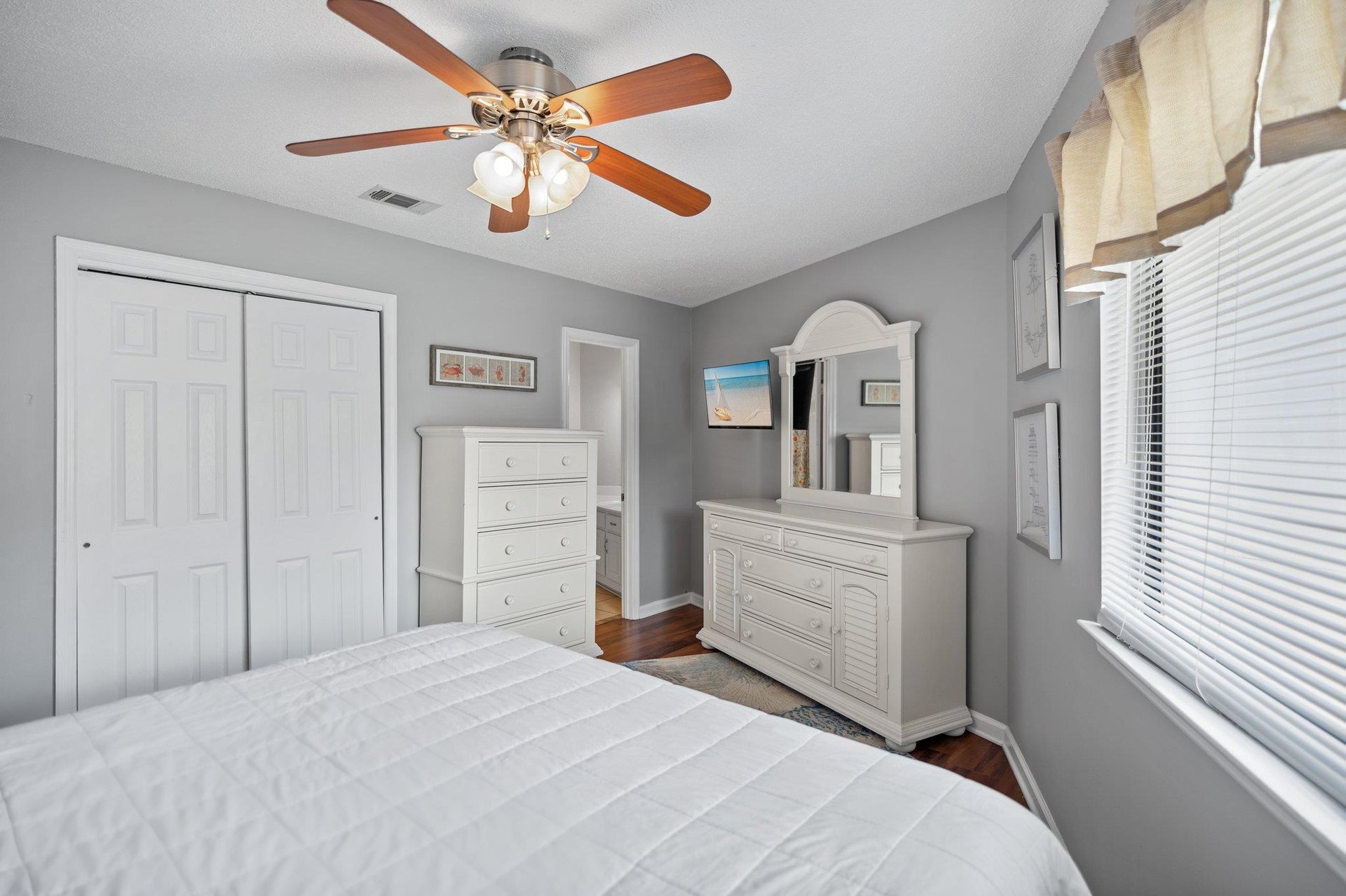 Primary Bedroom with King Bed and TV