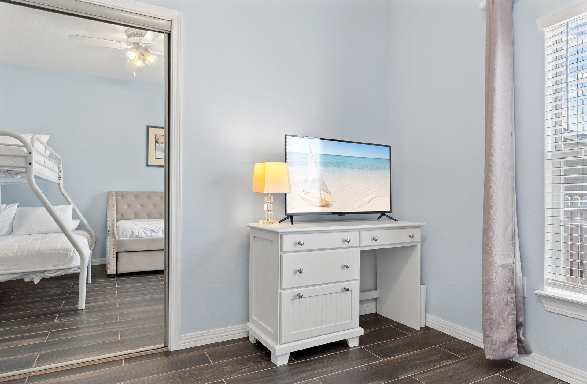 Bedroom 3 with Closet and Flat Screen TV on Dresser
