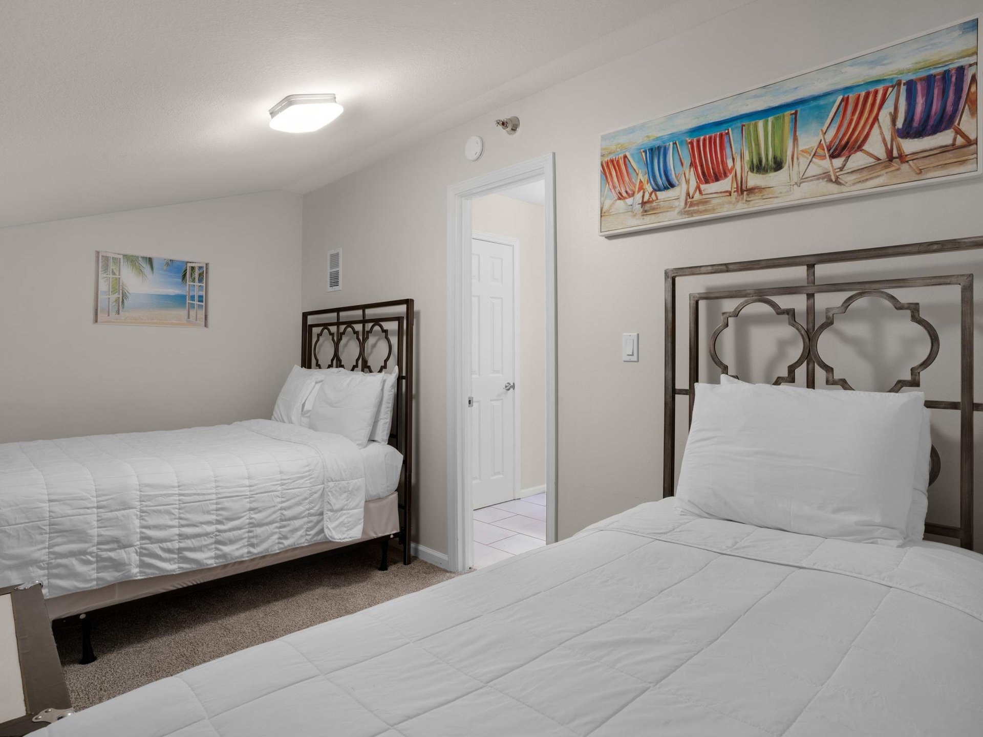 2nd floor LOFT bedroom 3 with queen and double bed with privacy door  walk thru king loft area to access this room