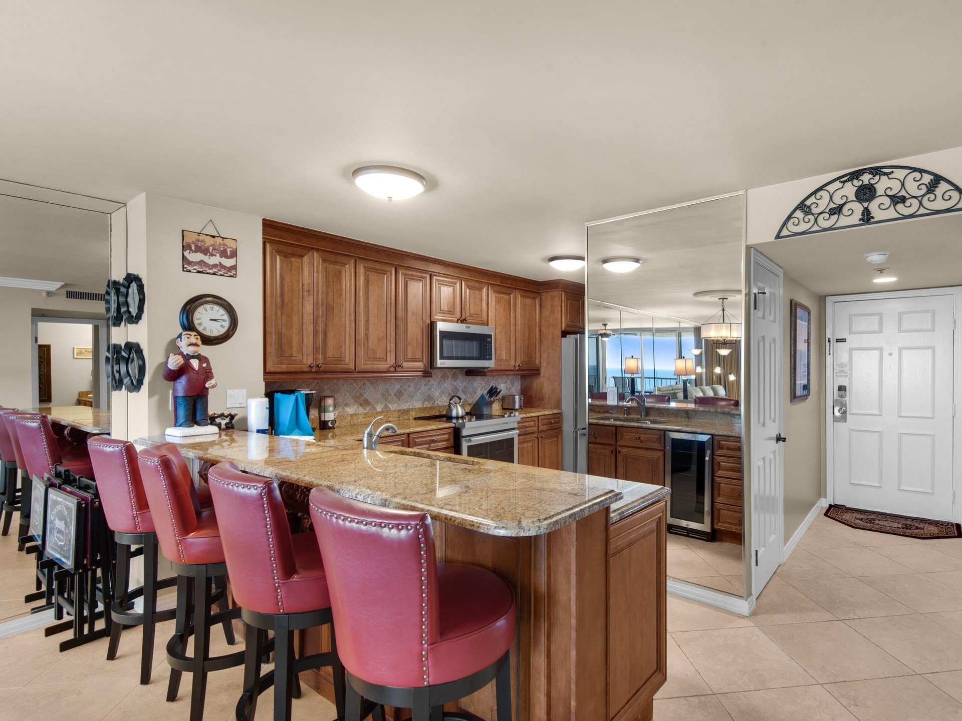 Fully Stocked Kitchen with Bar Seating