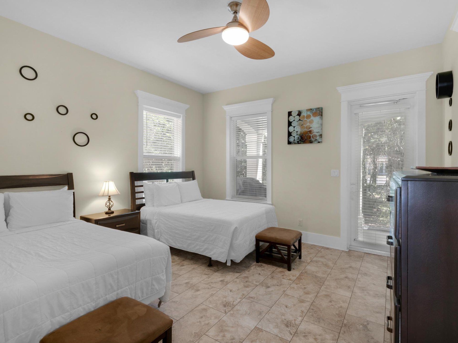 1st floor bedroom 1 with back door access to porch and grilling area