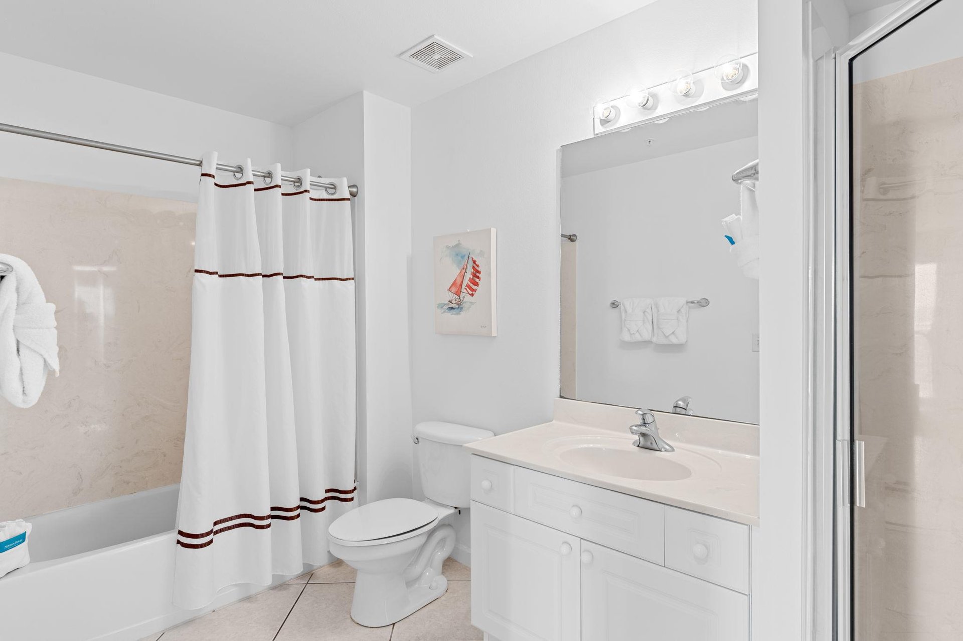 Primary Bathroom with Walk In Shower and Tub Shower Combo