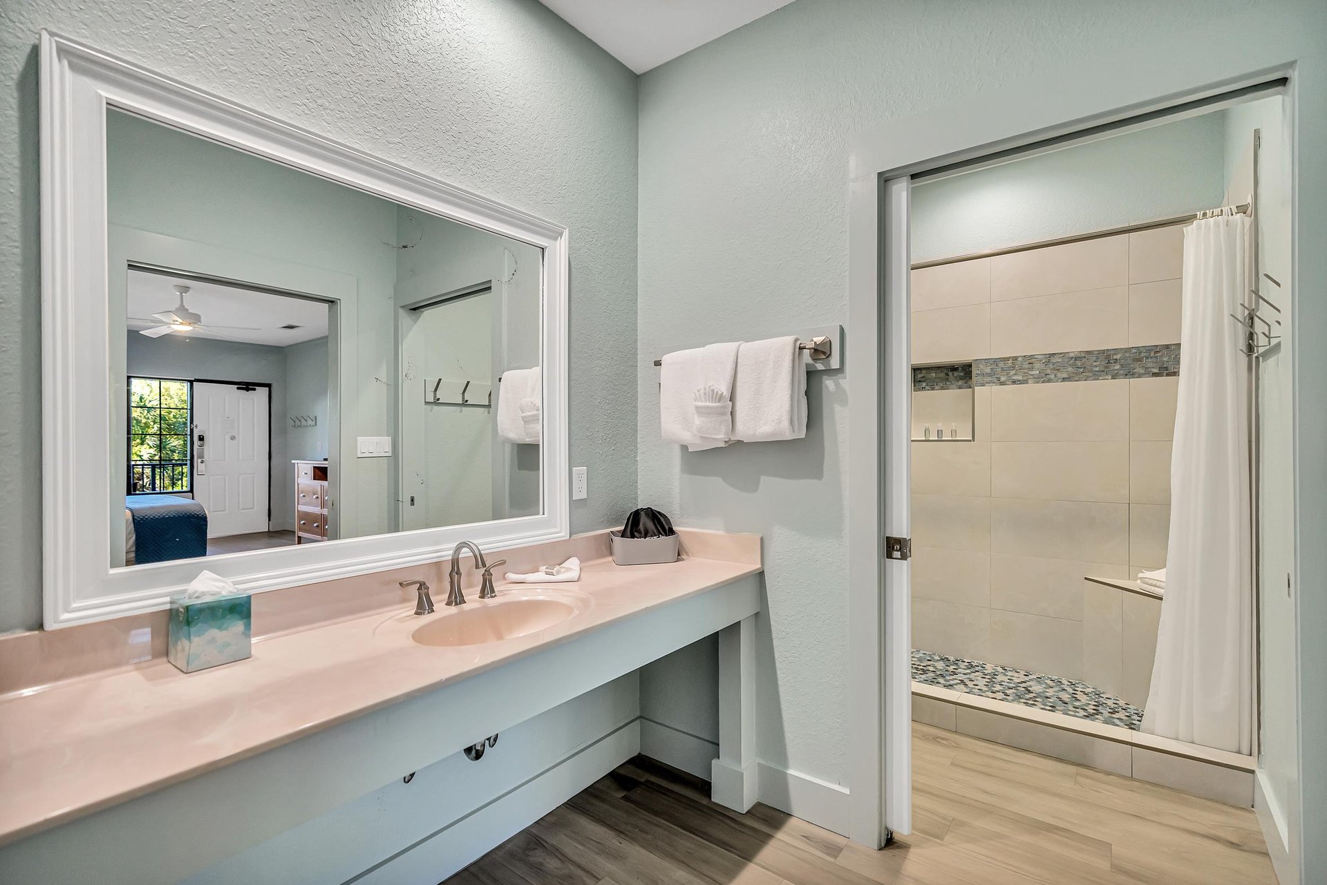 a bathroom with a large mirror