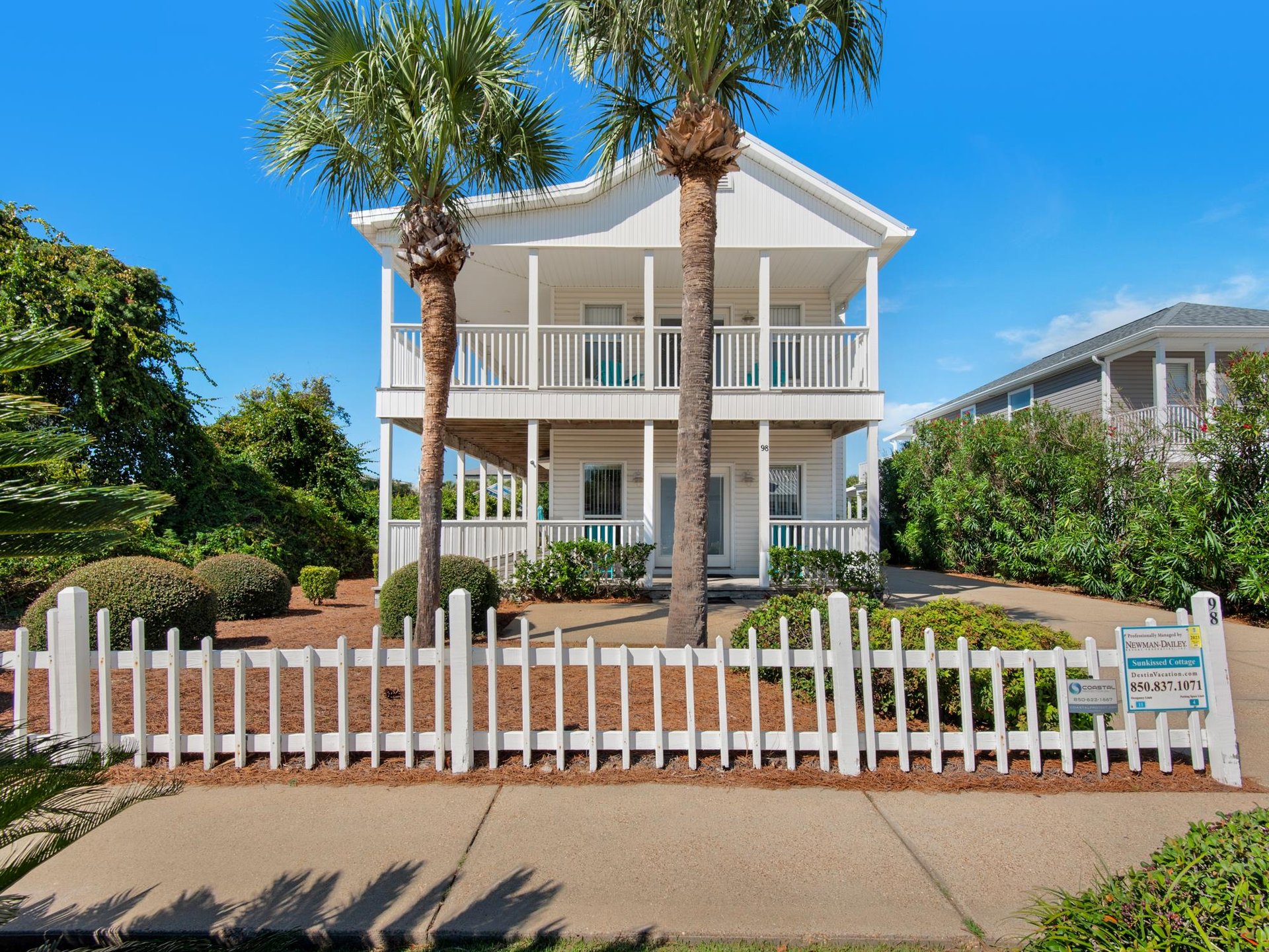 Sunkissed Cottage with white picket fence