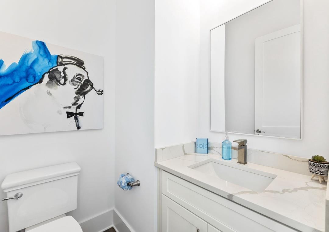 Half Bathroom on 1st Floor off Pool Area