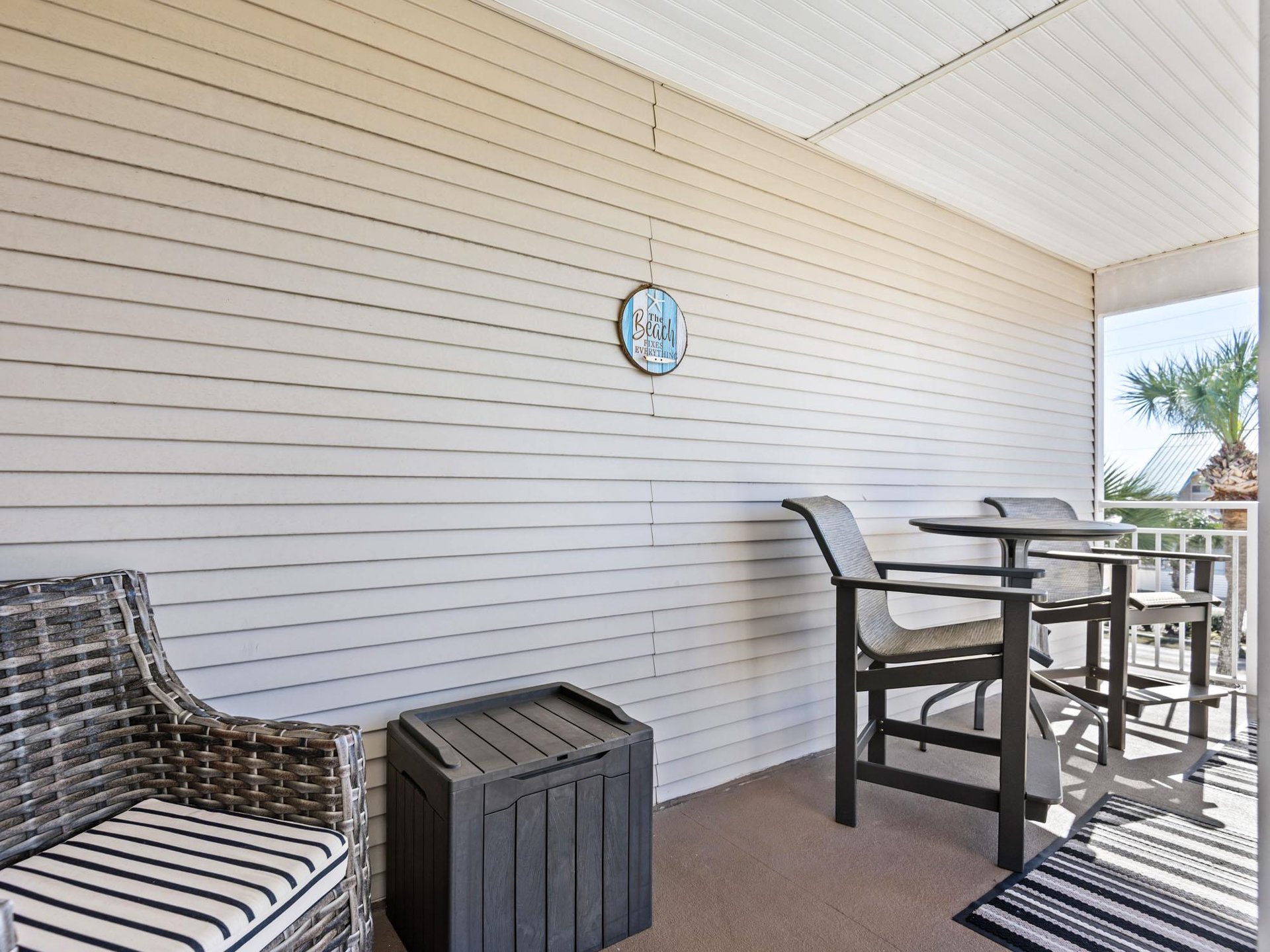 Relax on the private balcony with comfortable seating and dining space, perfect for morning coffee and evening cocktails.